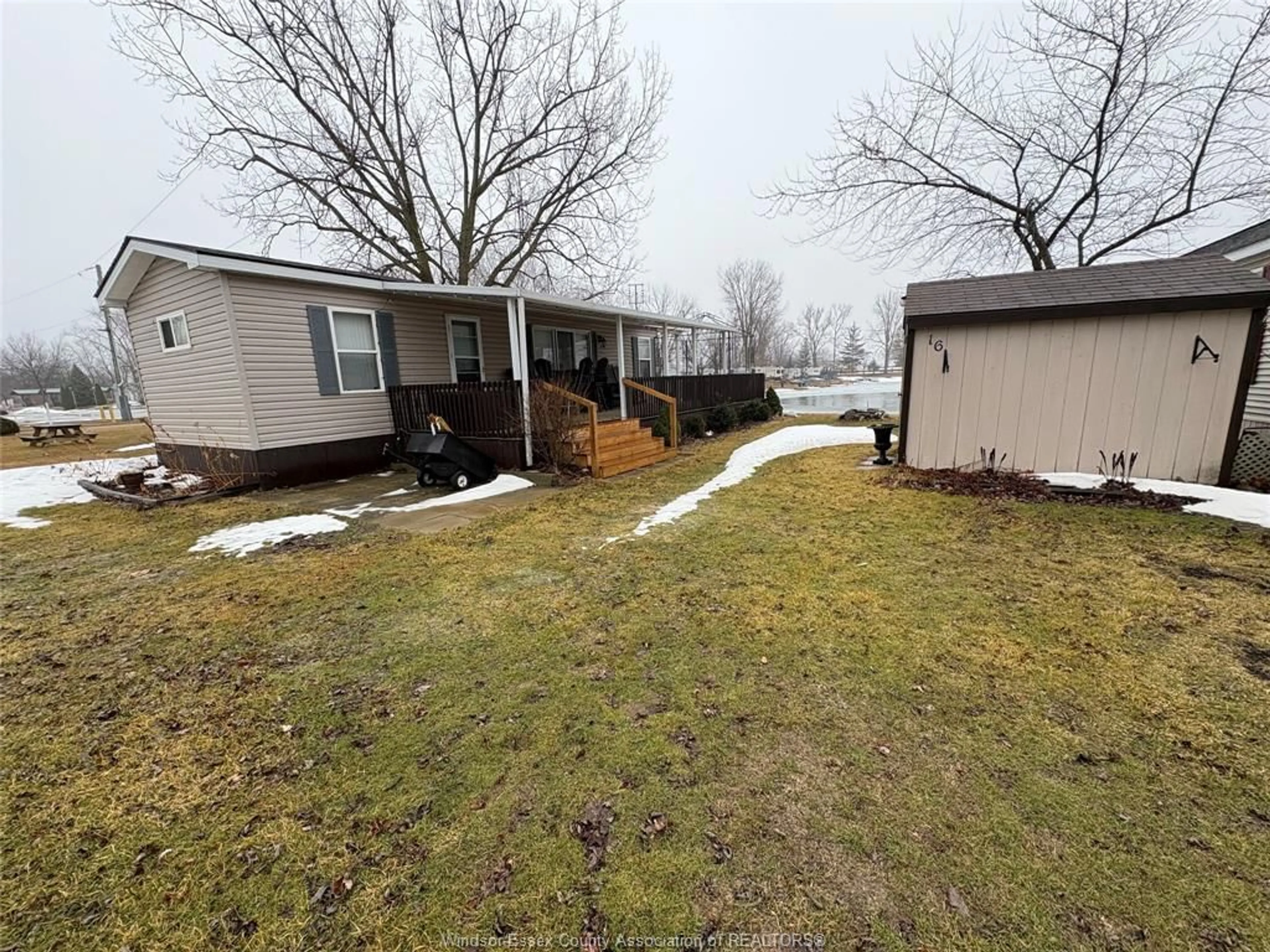 A pic from outside/outdoor area/front of a property/back of a property/a pic from drone, unknown for 16 MULBERRY Lane, Leamington Ontario N0P 2G0