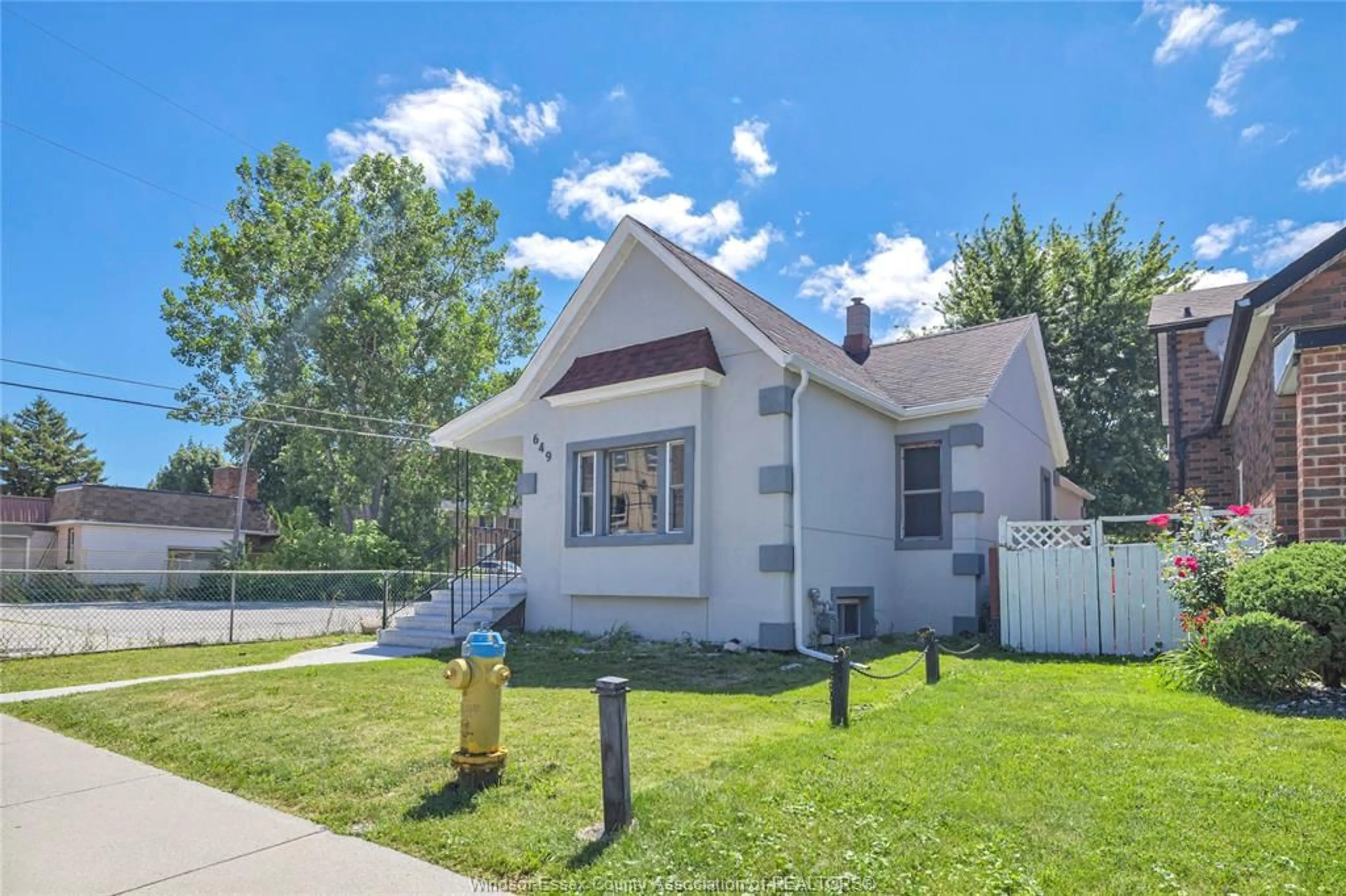 Home with vinyl exterior material, street for 649 CATARAQUI, Windsor Ontario N9V 3P2