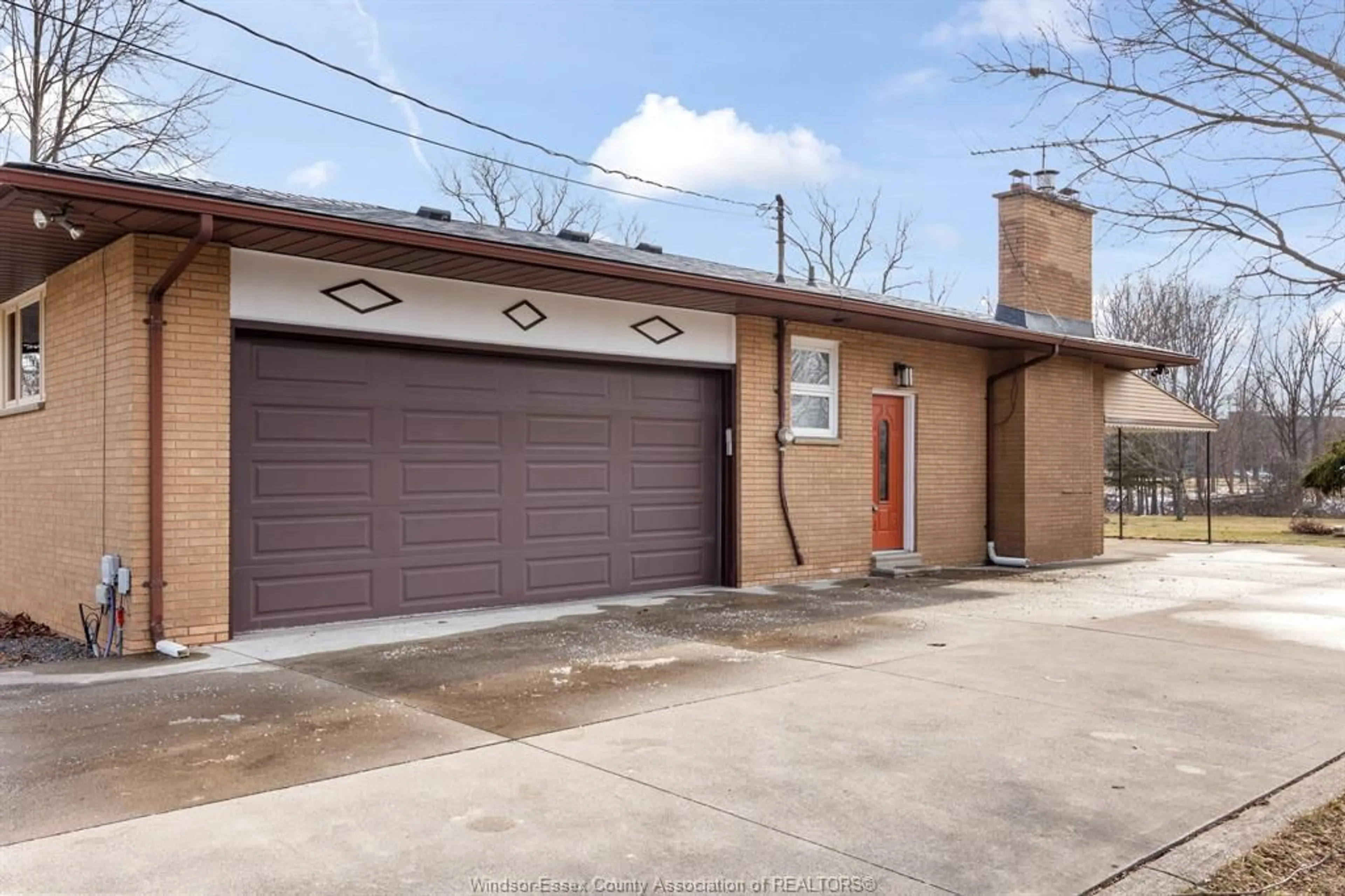 Home with brick exterior material, street for 3071 LAUZON Rd, Windsor Ontario N8T 2Z7