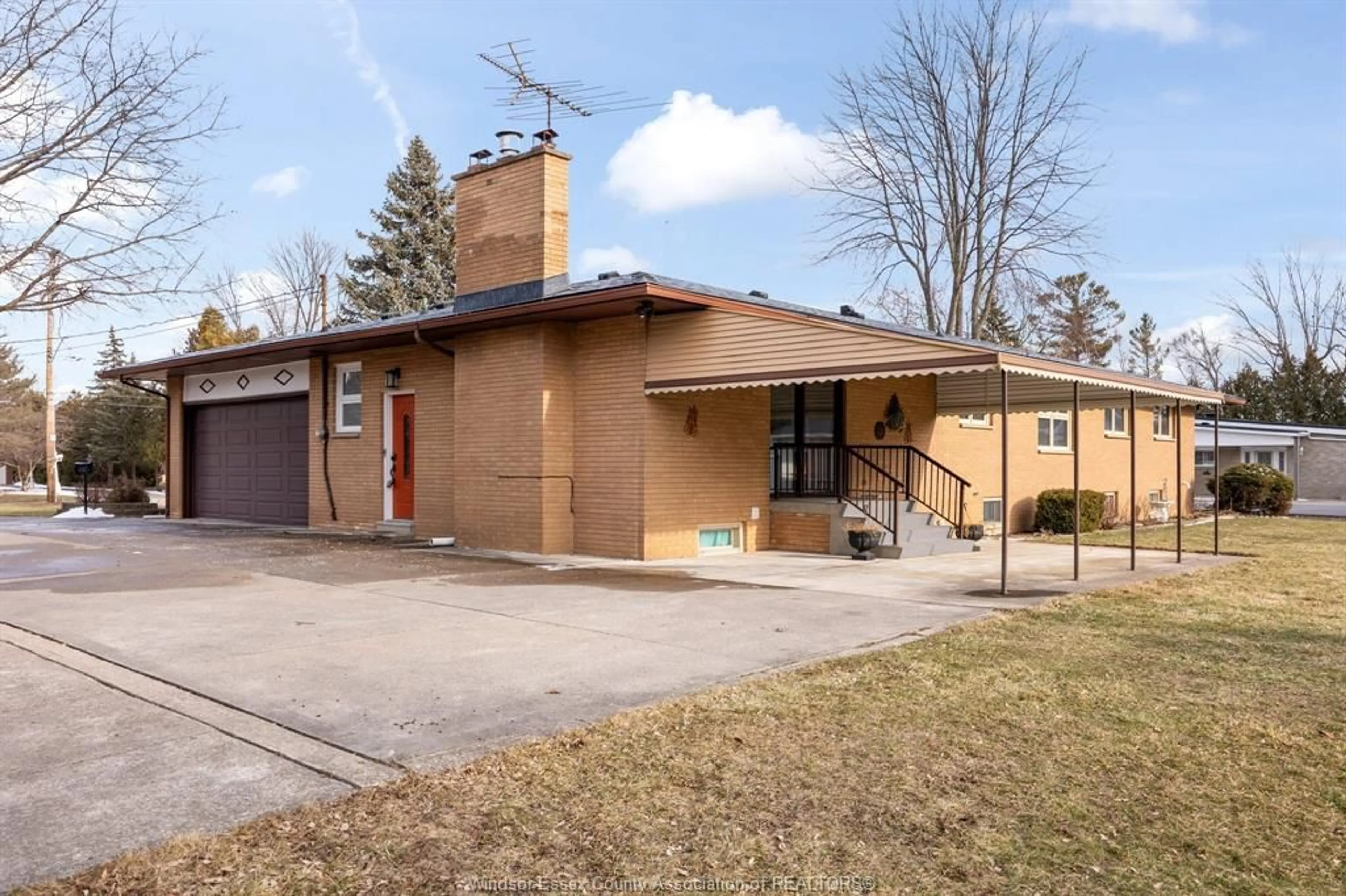 Home with brick exterior material, street for 3071 LAUZON Rd, Windsor Ontario N8T 2Z7