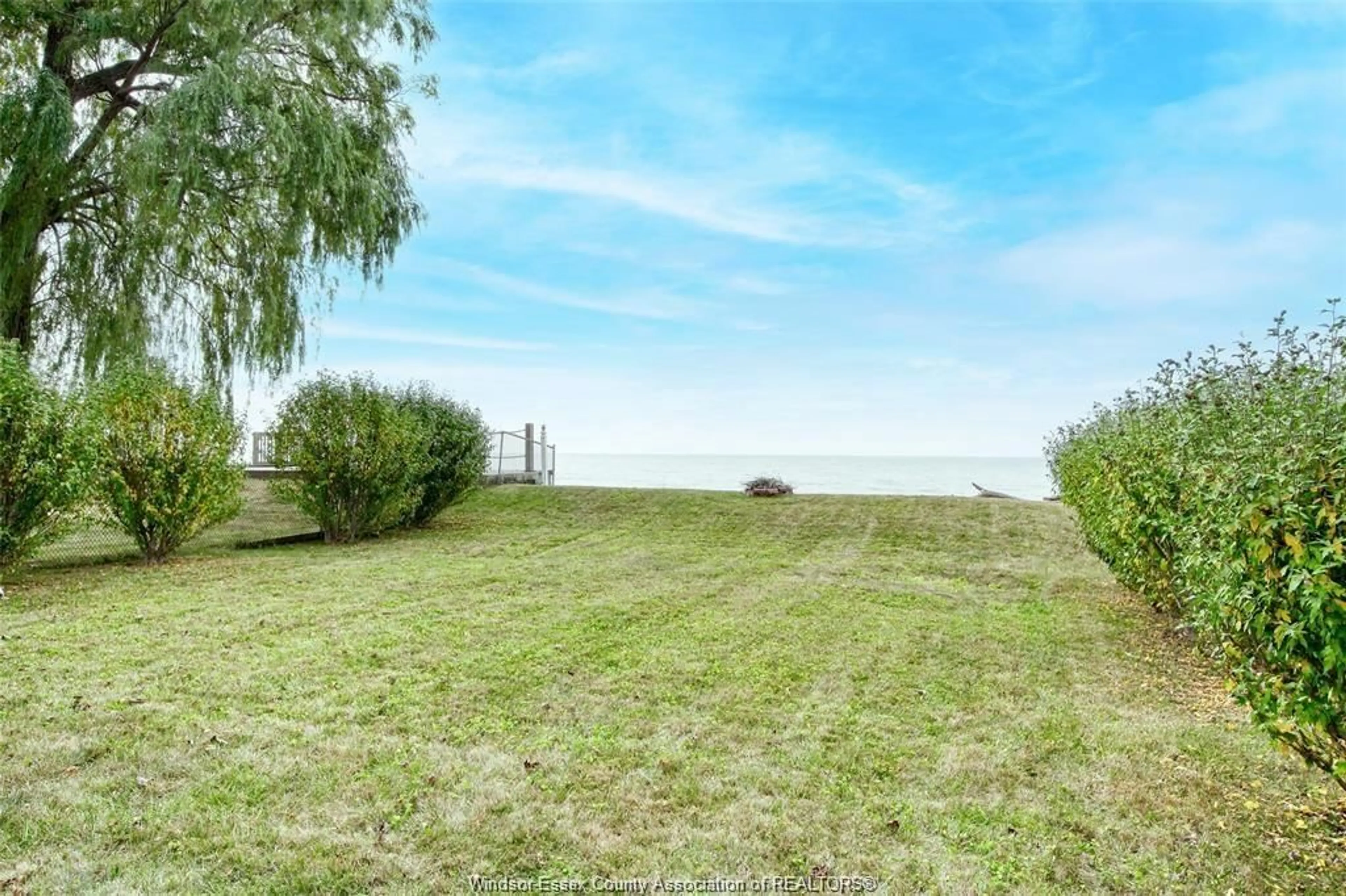 A pic from outside/outdoor area/front of a property/back of a property/a pic from drone, water/lake/river/ocean view for 127 LAKEWOOD Dr, Amherstburg Ontario N9V 2Y8