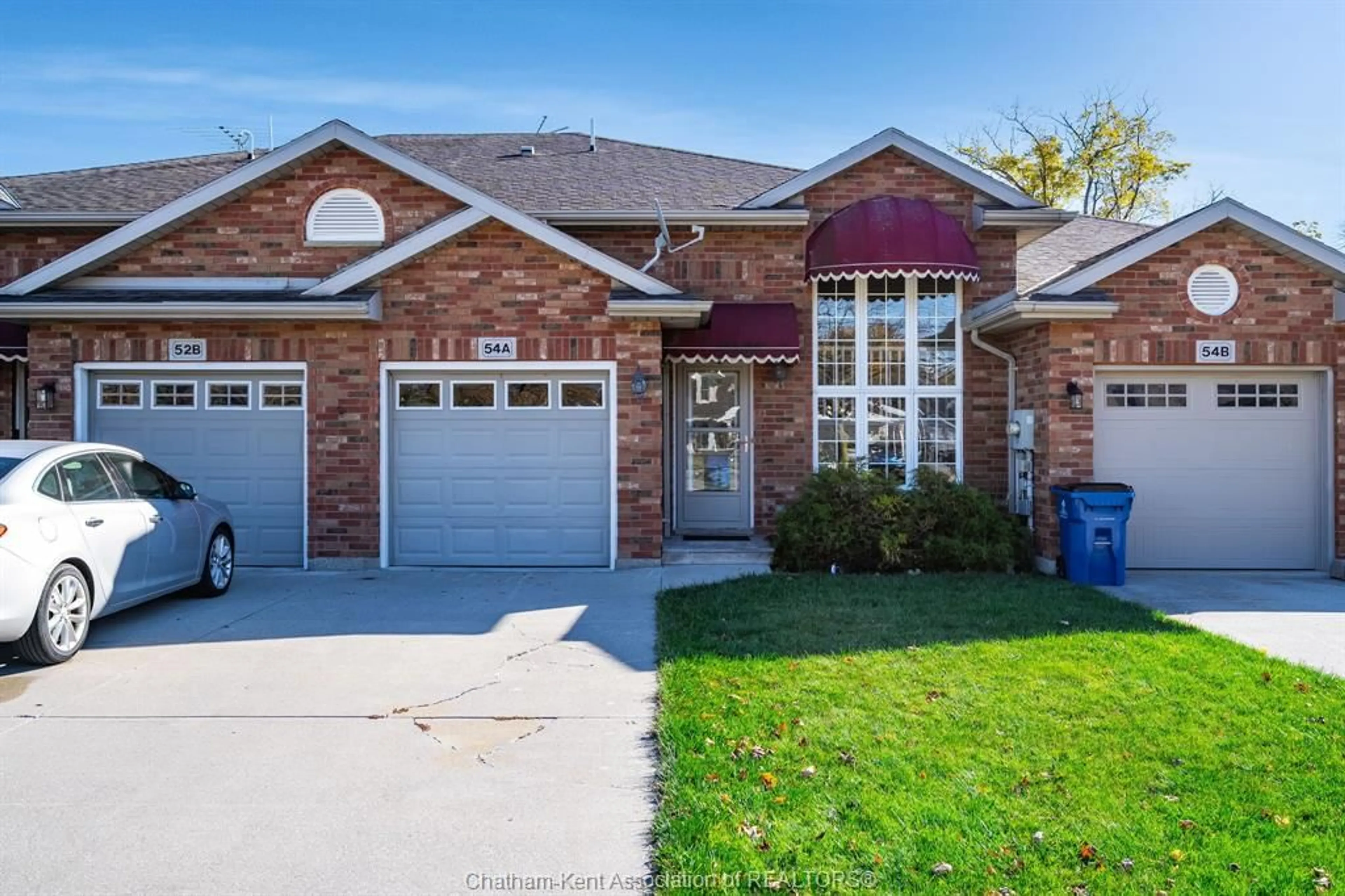 Home with brick exterior material, street for 54A Queen St, Tilbury Ontario N0P 2L0