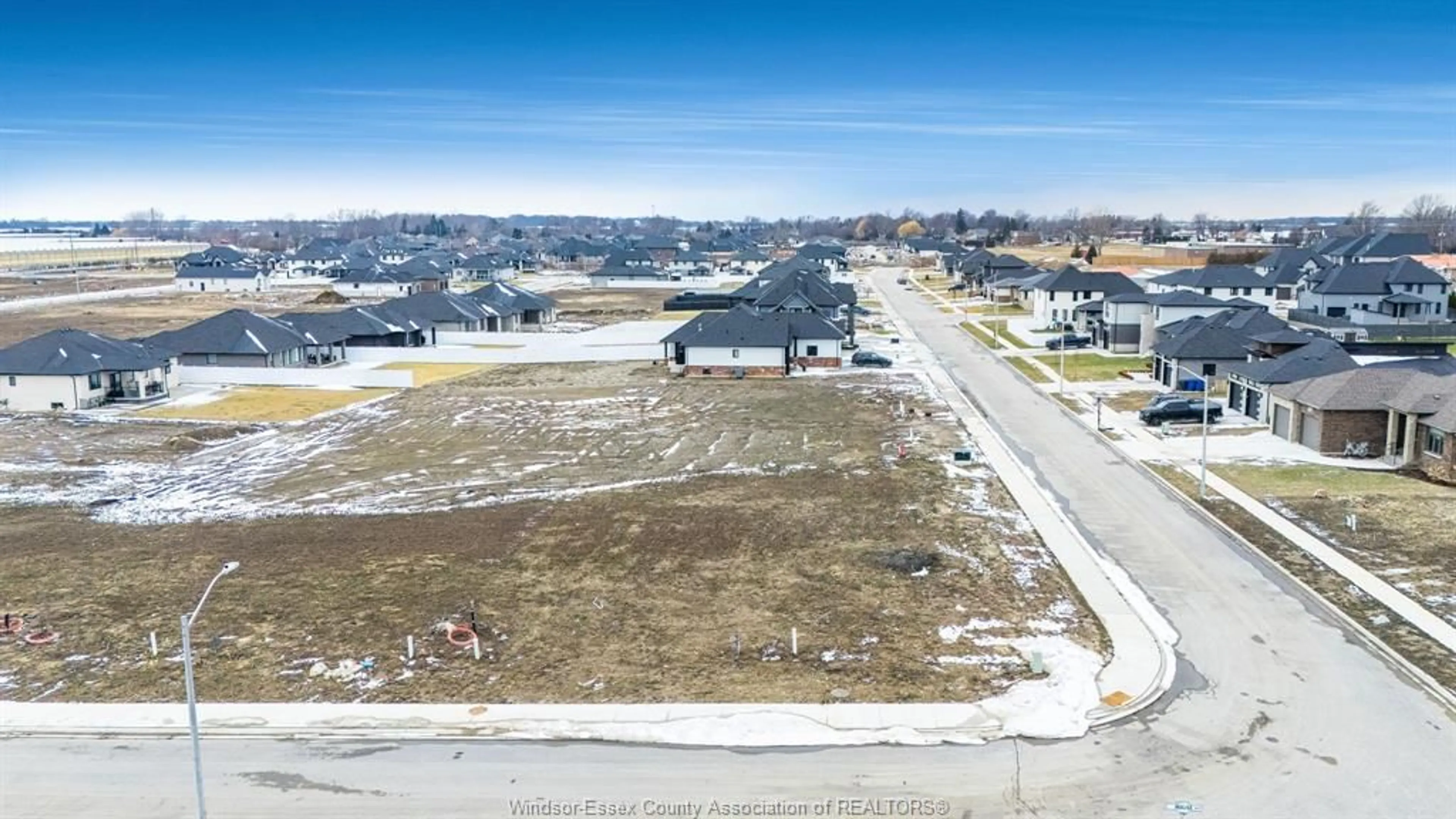 A pic from outside/outdoor area/front of a property/back of a property/a pic from drone, street for 1875 Molise Blvd, Kingsville Ontario N0P 2G0