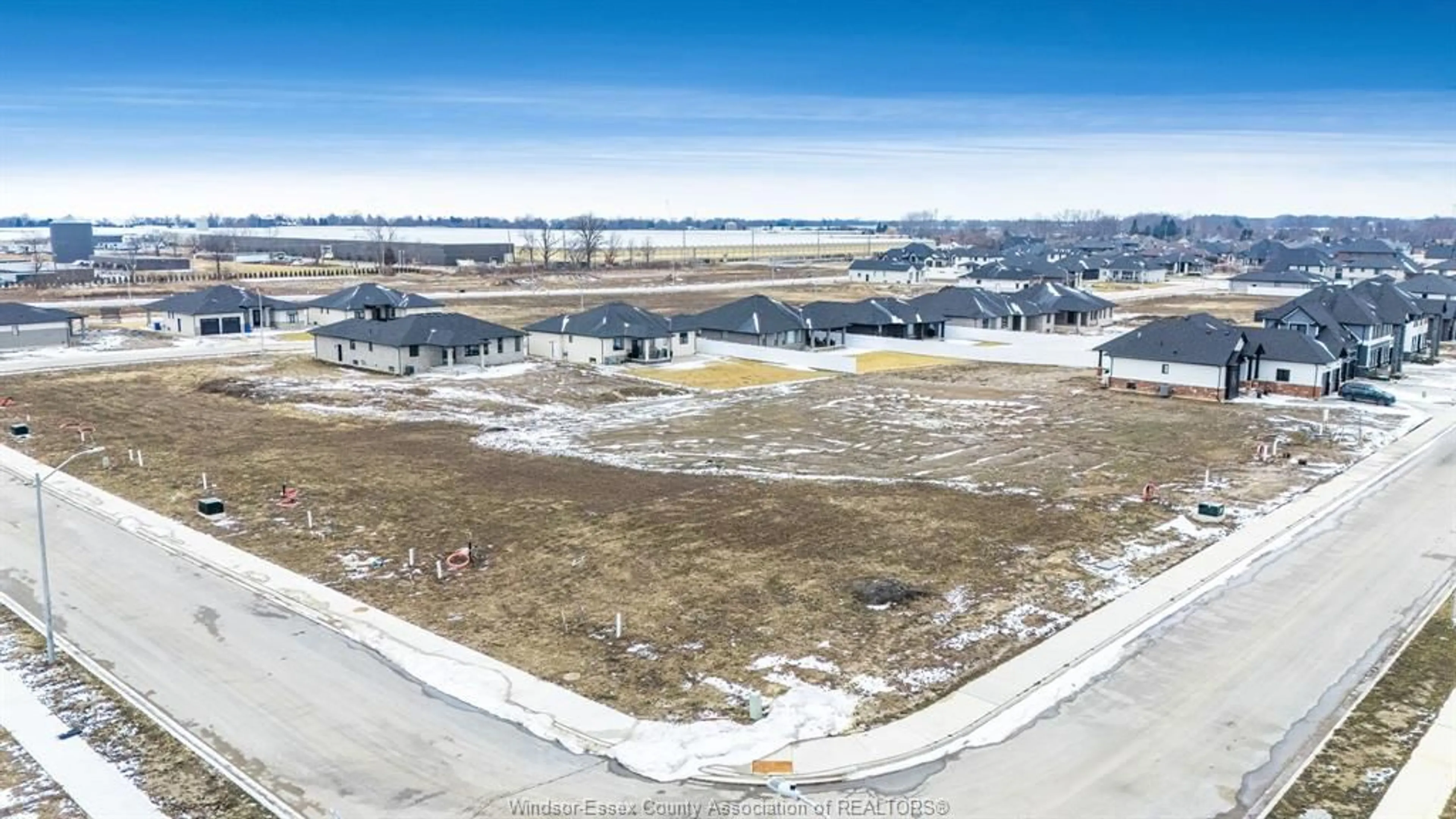 A pic from outside/outdoor area/front of a property/back of a property/a pic from drone, street for 1875 Molise Blvd, Kingsville Ontario N0P 2G0