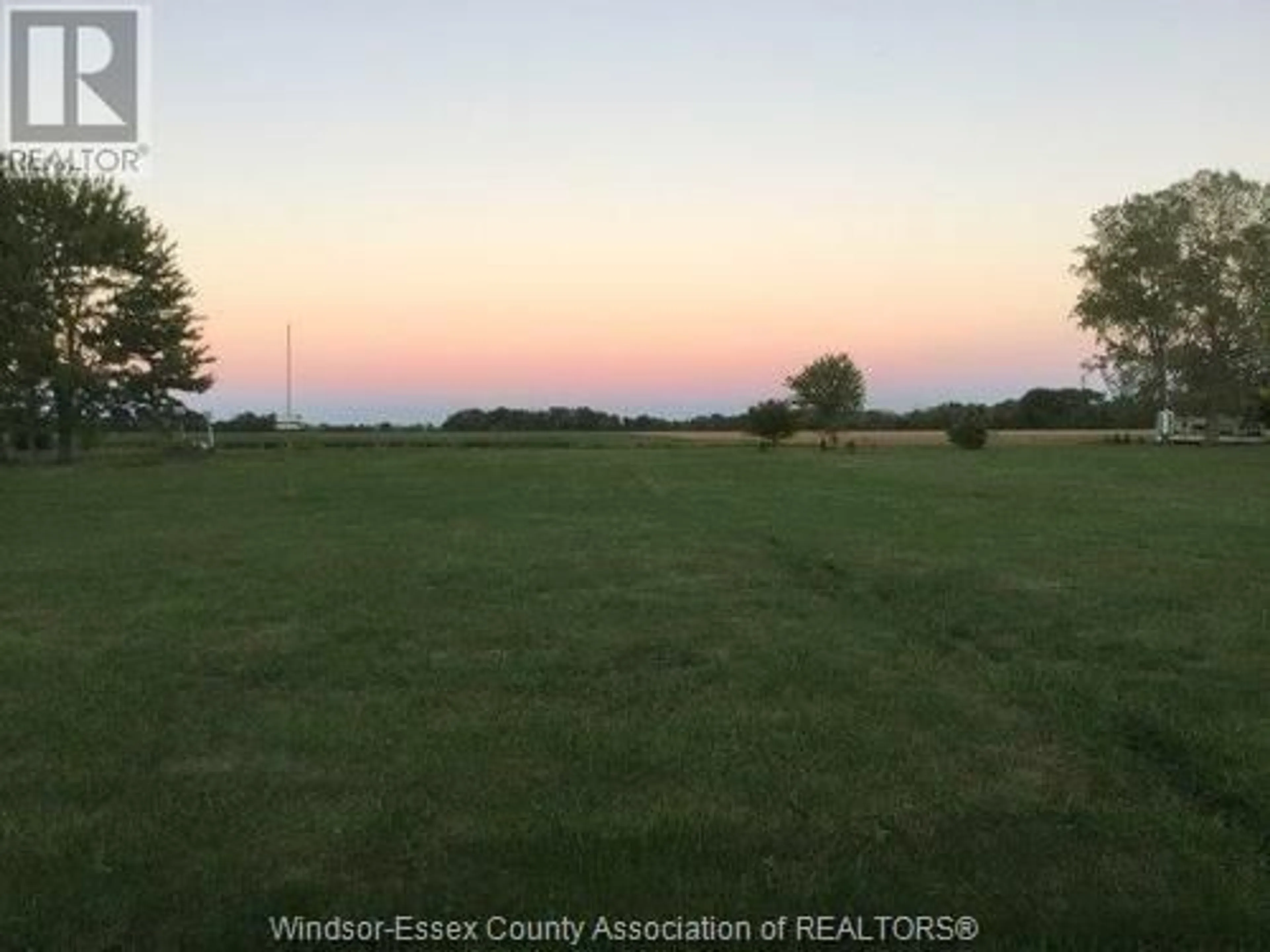 A pic from outside/outdoor area/front of a property/back of a property/a pic from drone, forest/trees view for 949 West Shore Rd, Pelee Island Ontario N0R 1M0