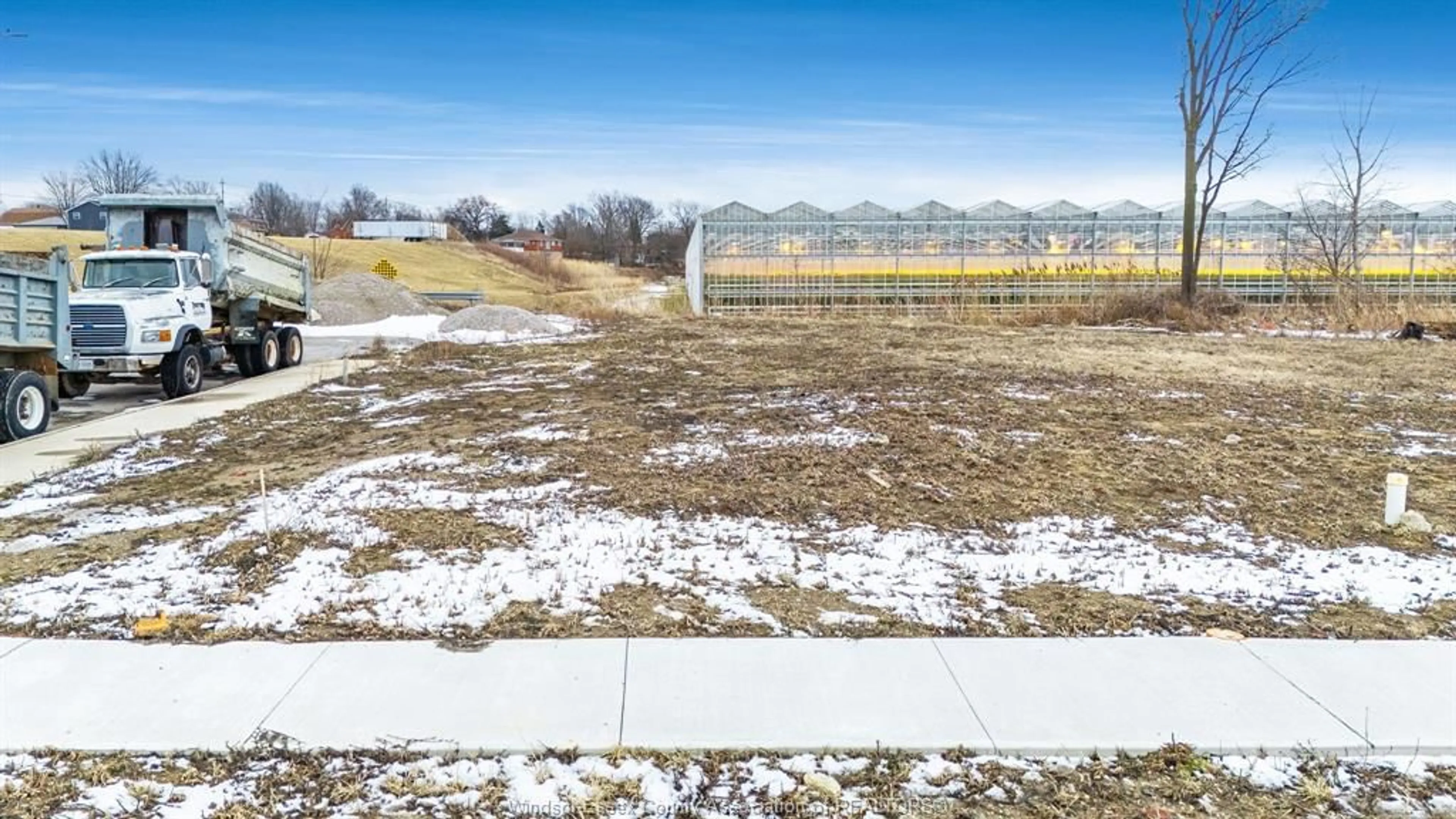 A pic from outside/outdoor area/front of a property/back of a property/a pic from drone, water/lake/river/ocean view for 1876 Molise Blvd, Kingsville Ontario N0P 2G0