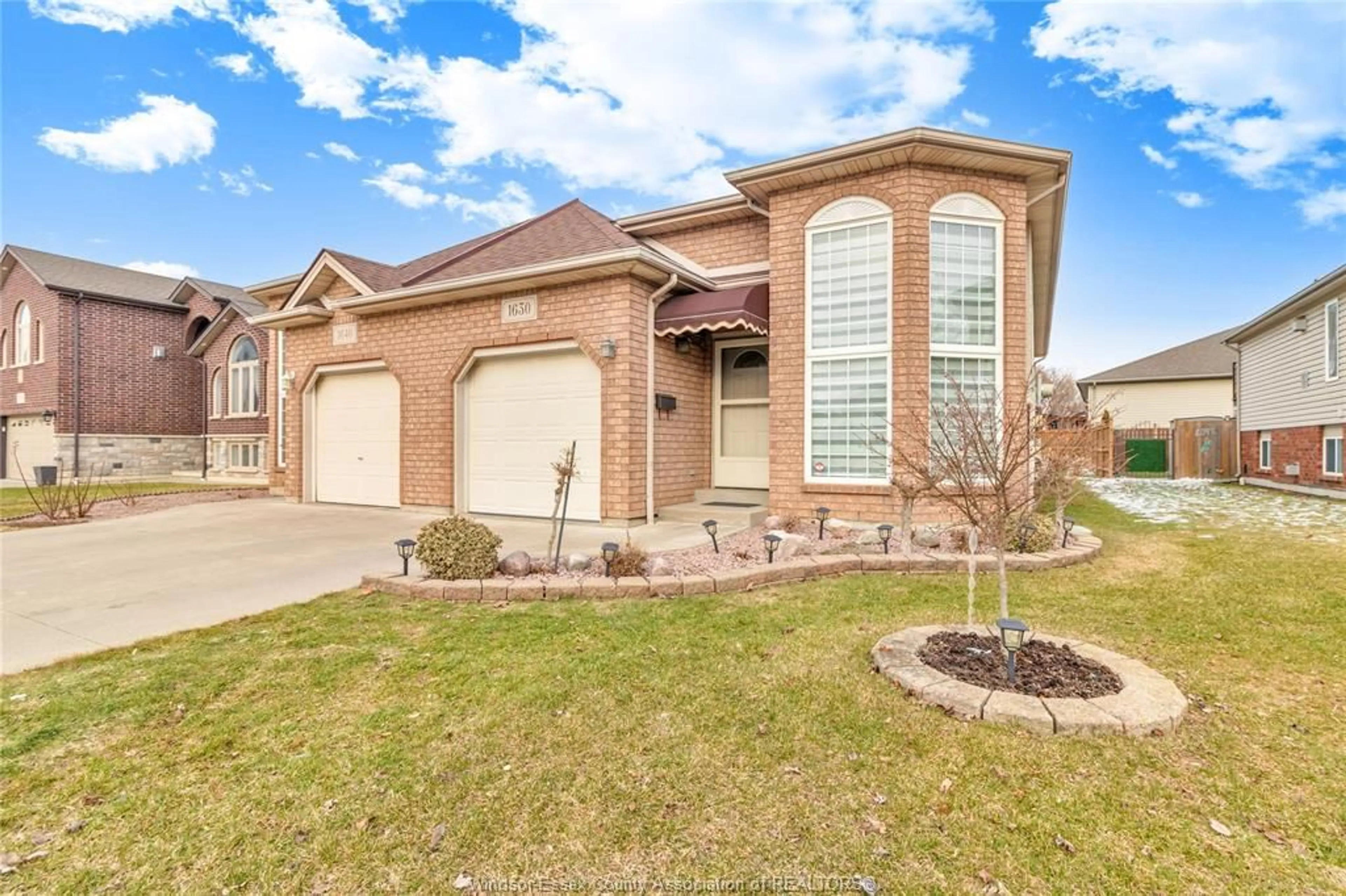 Home with brick exterior material, street for 1630 DUROCHER Dr, LaSalle Ontario N9H 2N1