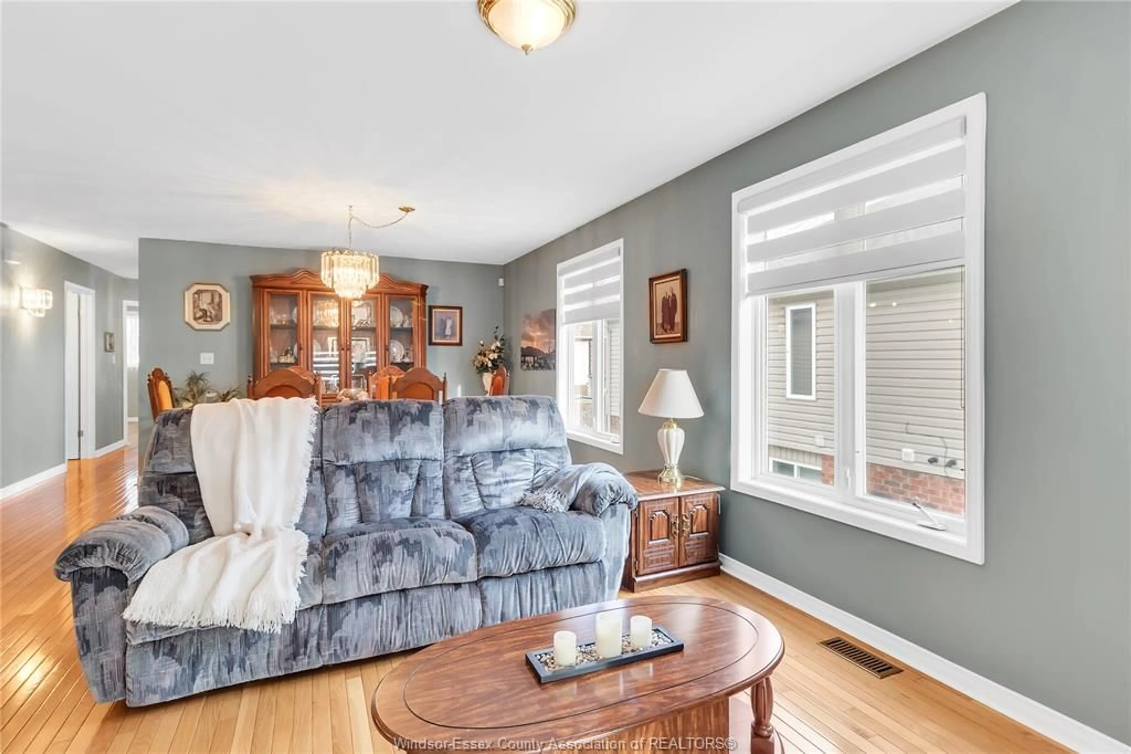 Living room with furniture, wood/laminate floor for 1630 DUROCHER Dr, LaSalle Ontario N9H 2N1