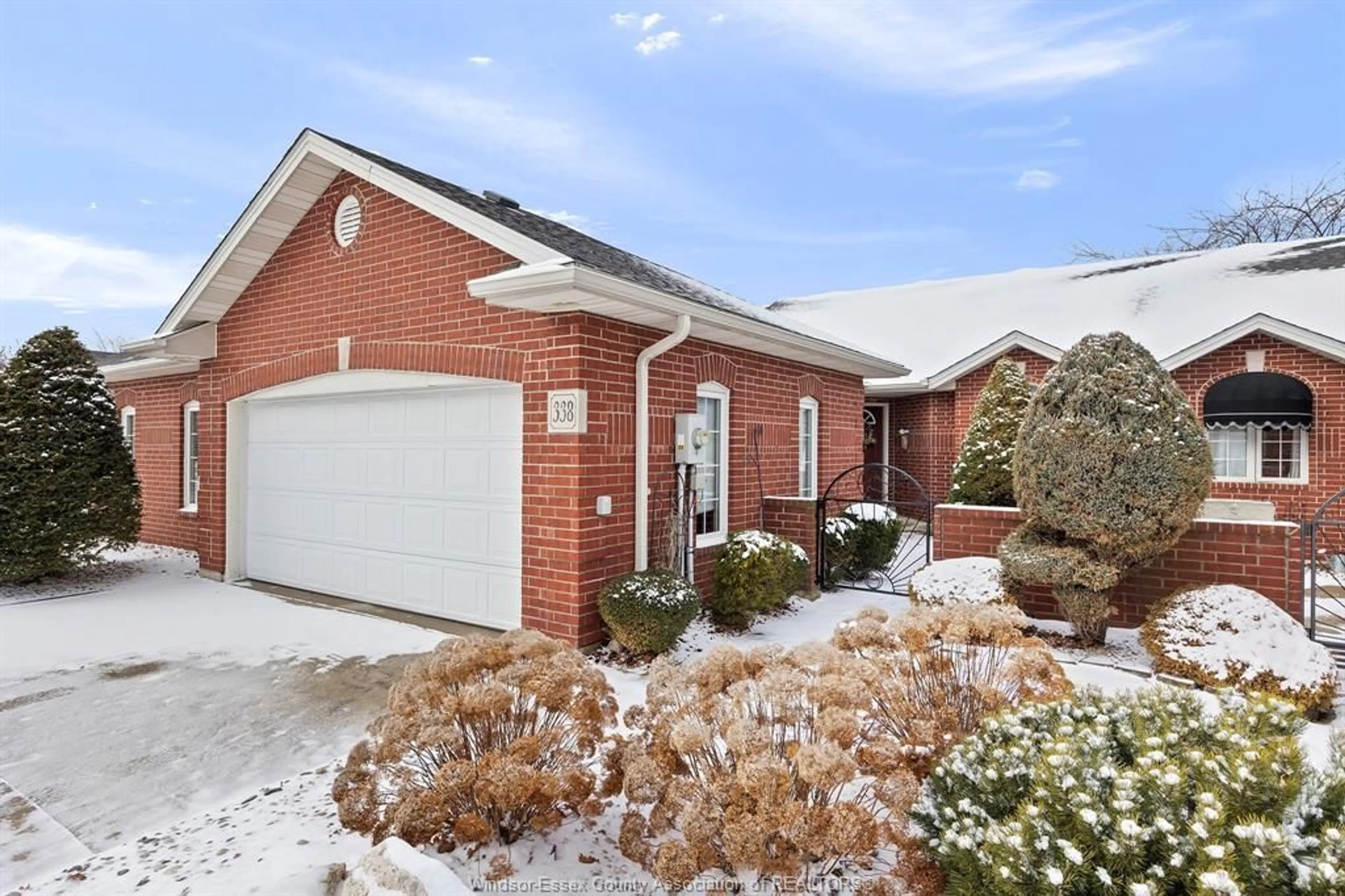 Home with brick exterior material, street for 338 SADDLE Lane, Kingsville Ontario N9Y 4A6