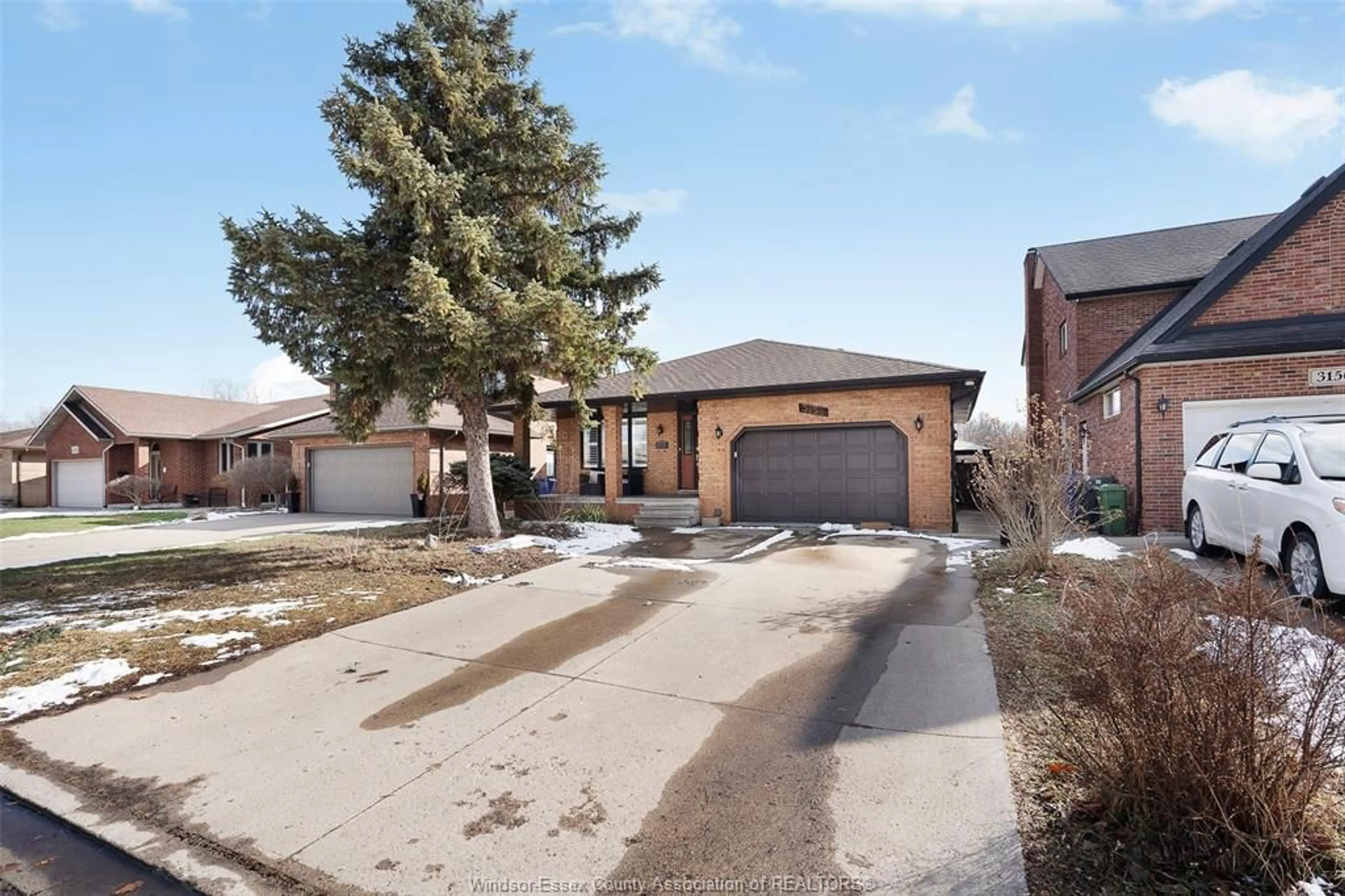 Home with brick exterior material, street for 3154 FAZIO Dr, Windsor Ontario N9E 4G6