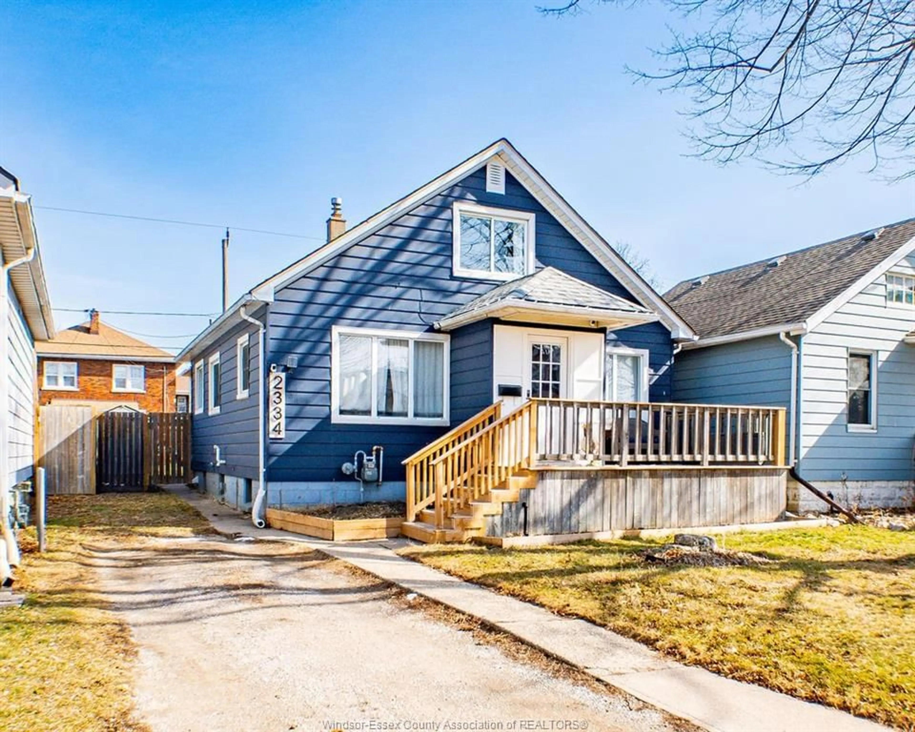 Home with vinyl exterior material, street for 2334 Highland, Windsor Ontario N8X 3S5