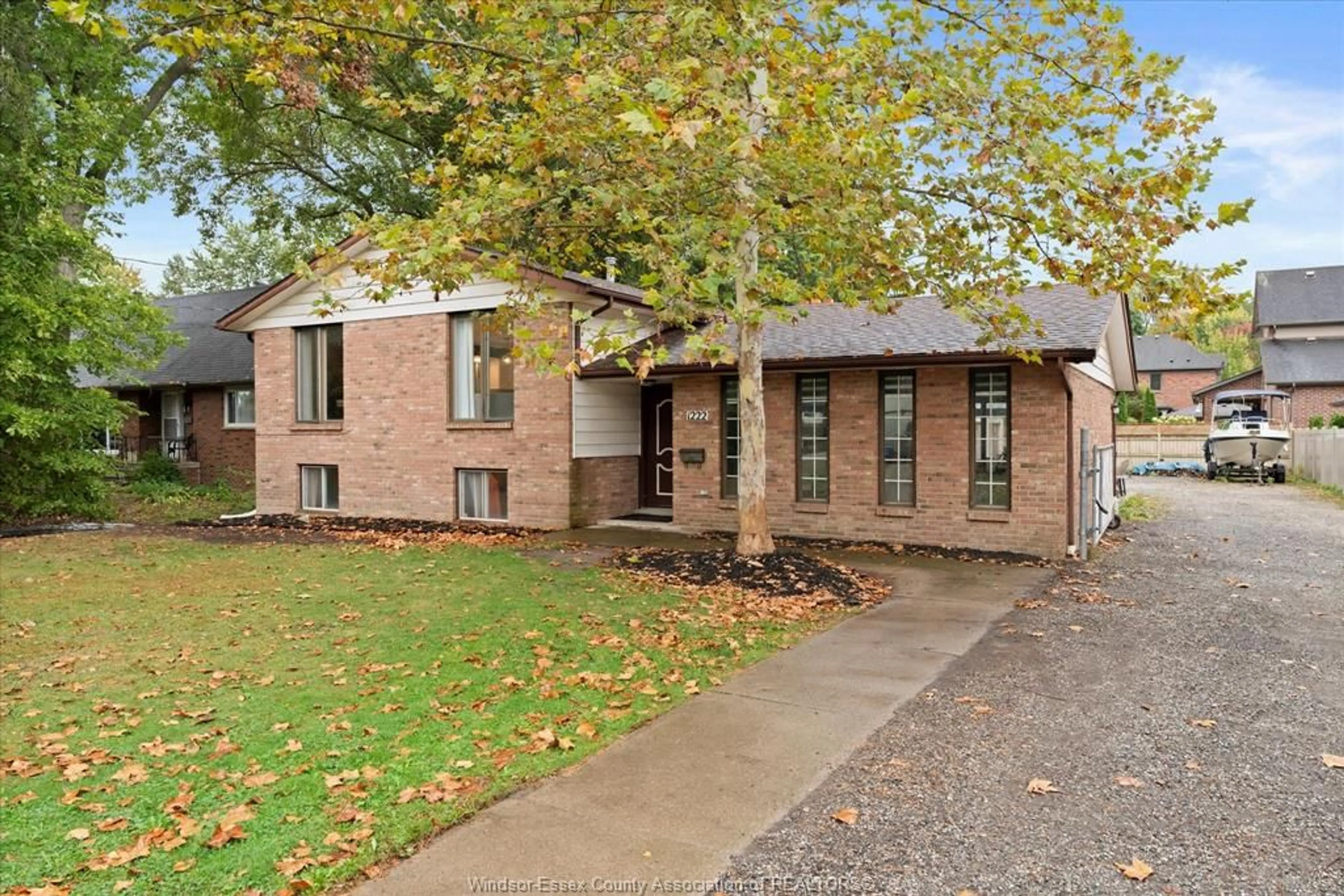 Home with brick exterior material, street for 1222 REAUME Rd, LaSalle Ontario N9J 1C1