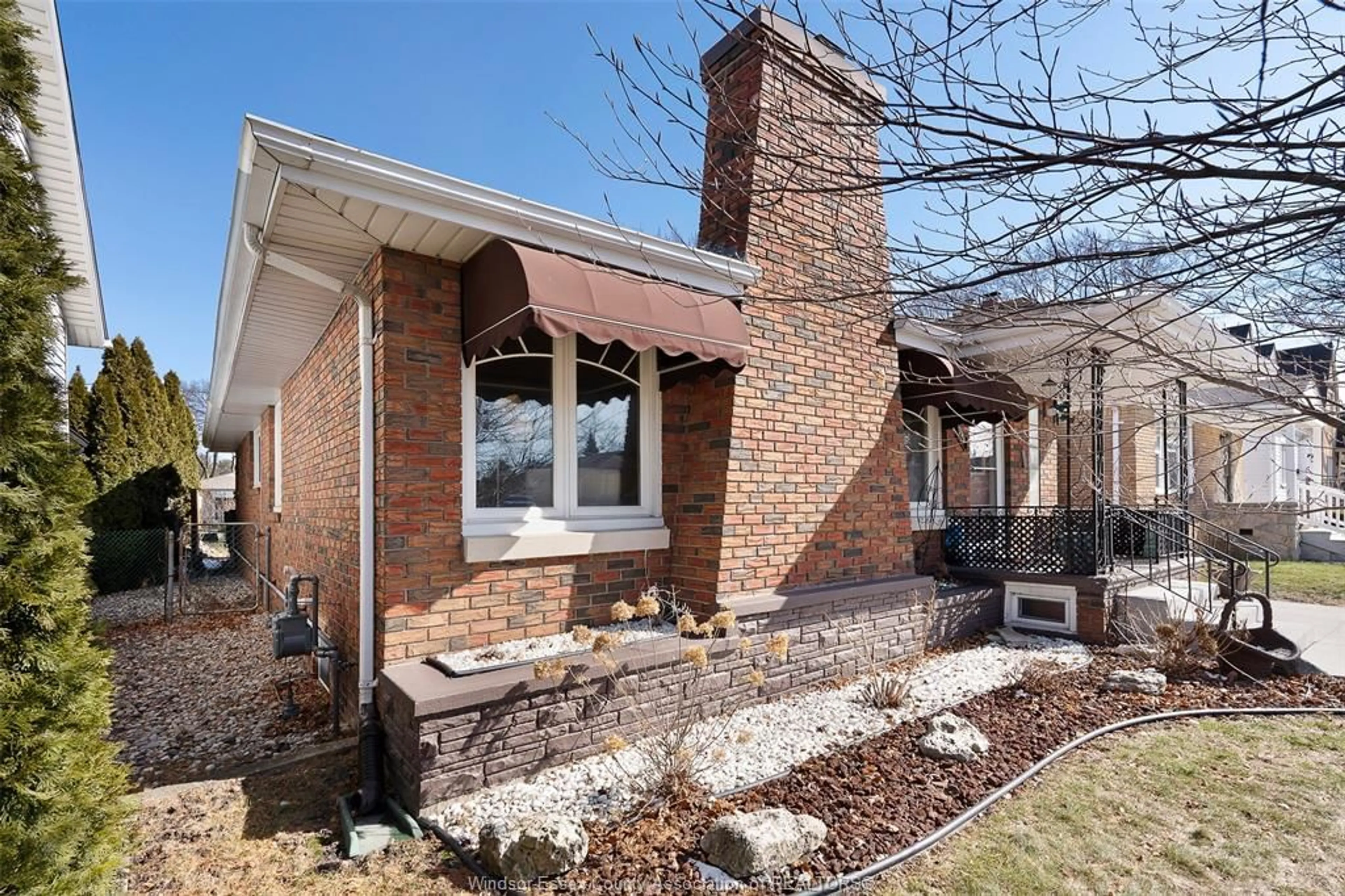 Home with brick exterior material, street for 244 ISABELLE Pl, Windsor Ontario N8S 3A6
