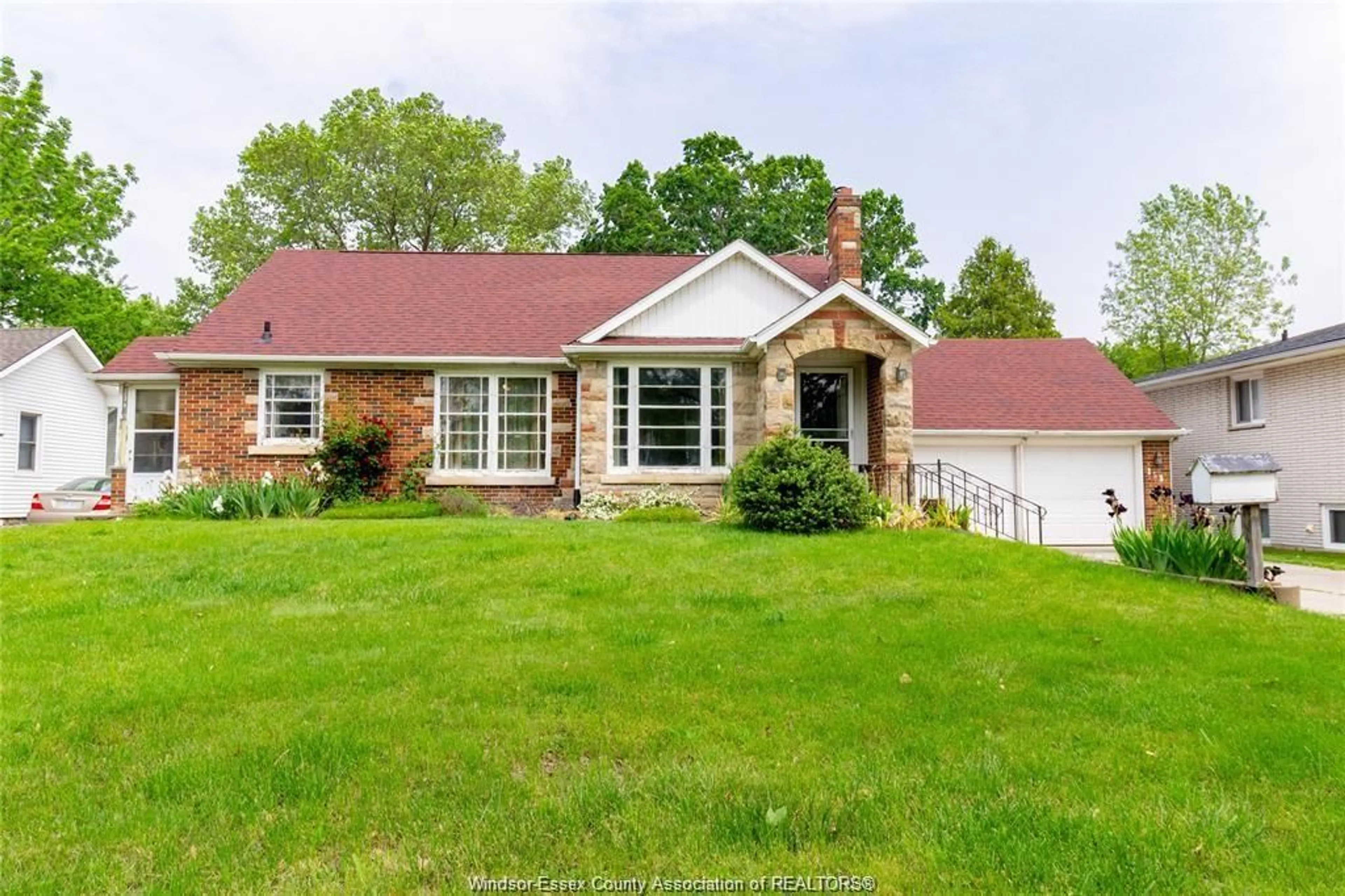 Home with brick exterior material, street for 153 TALBOT St, Leamington Ontario N8H 1N2