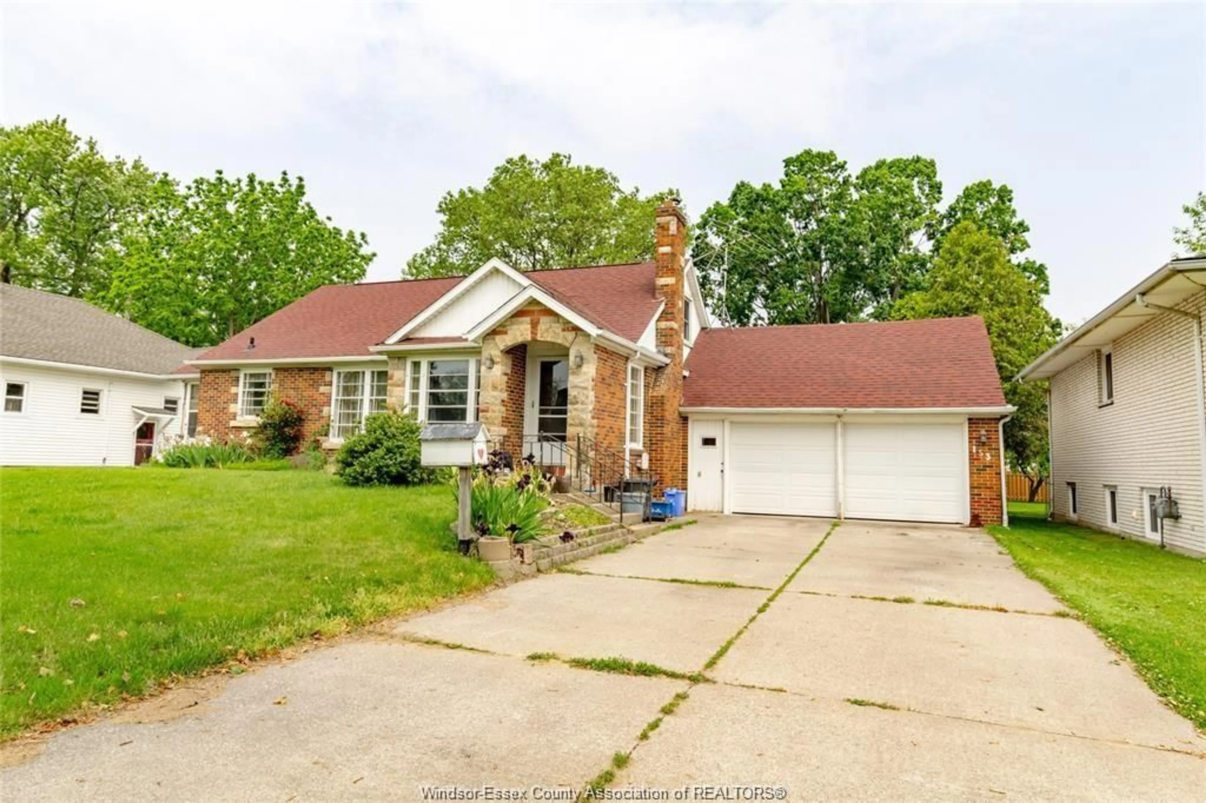 Home with brick exterior material, street for 153 TALBOT St, Leamington Ontario N8H 1N2