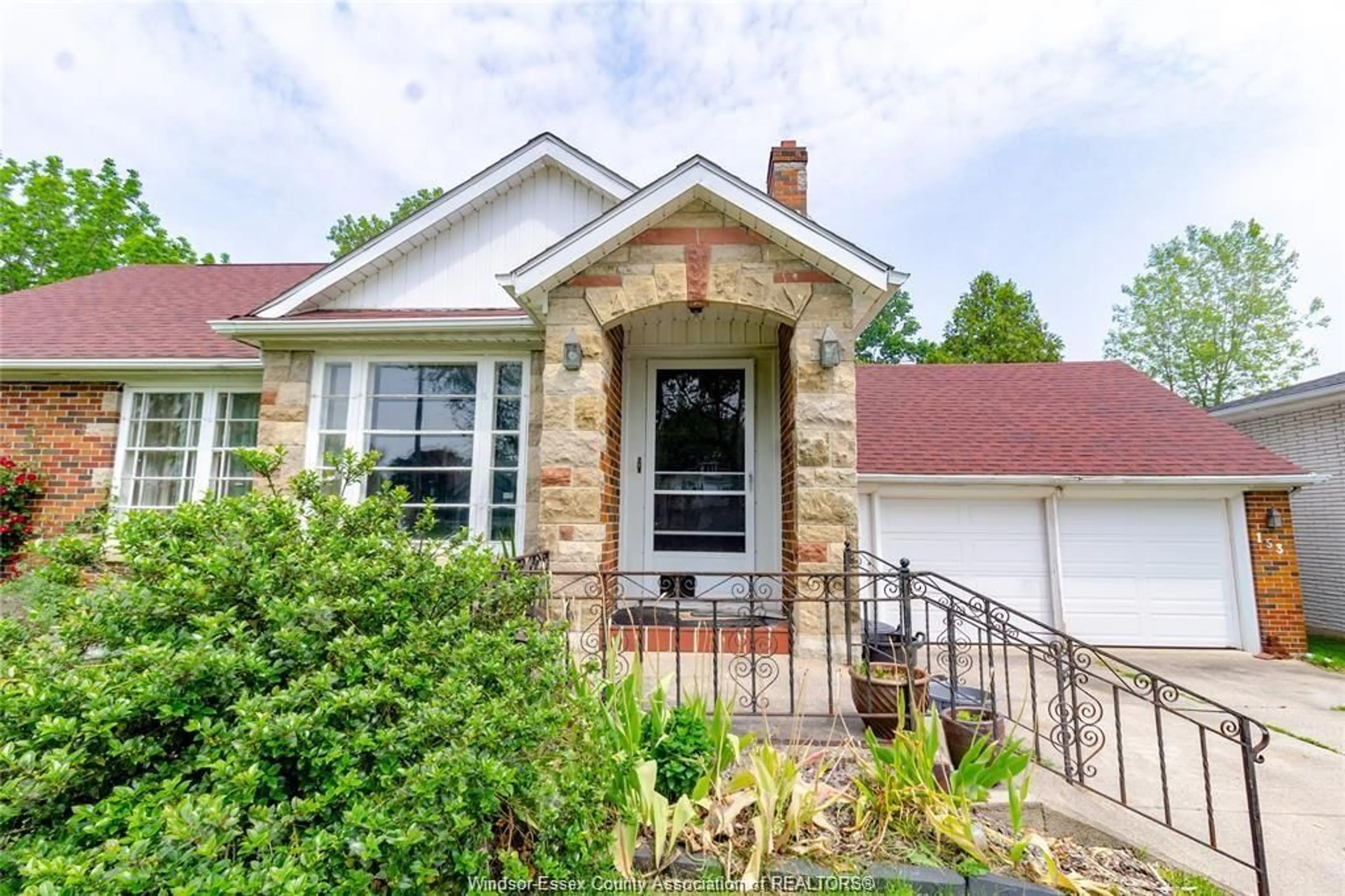 Home with brick exterior material, street for 153 TALBOT St, Leamington Ontario N8H 1N2