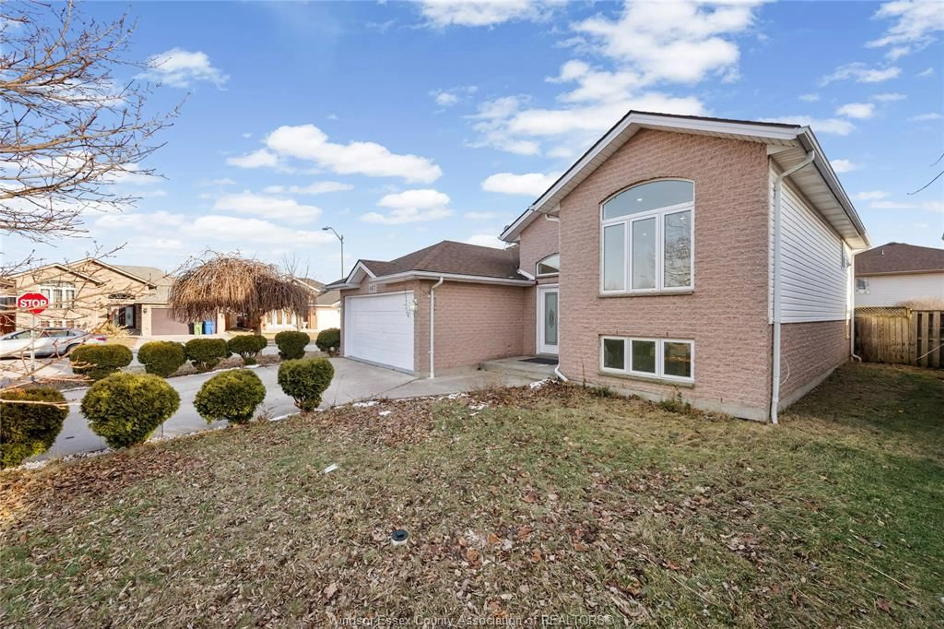 Home with brick exterior material, street for 4477 SPAGO CRES, Windsor Ontario N9G 2Z6