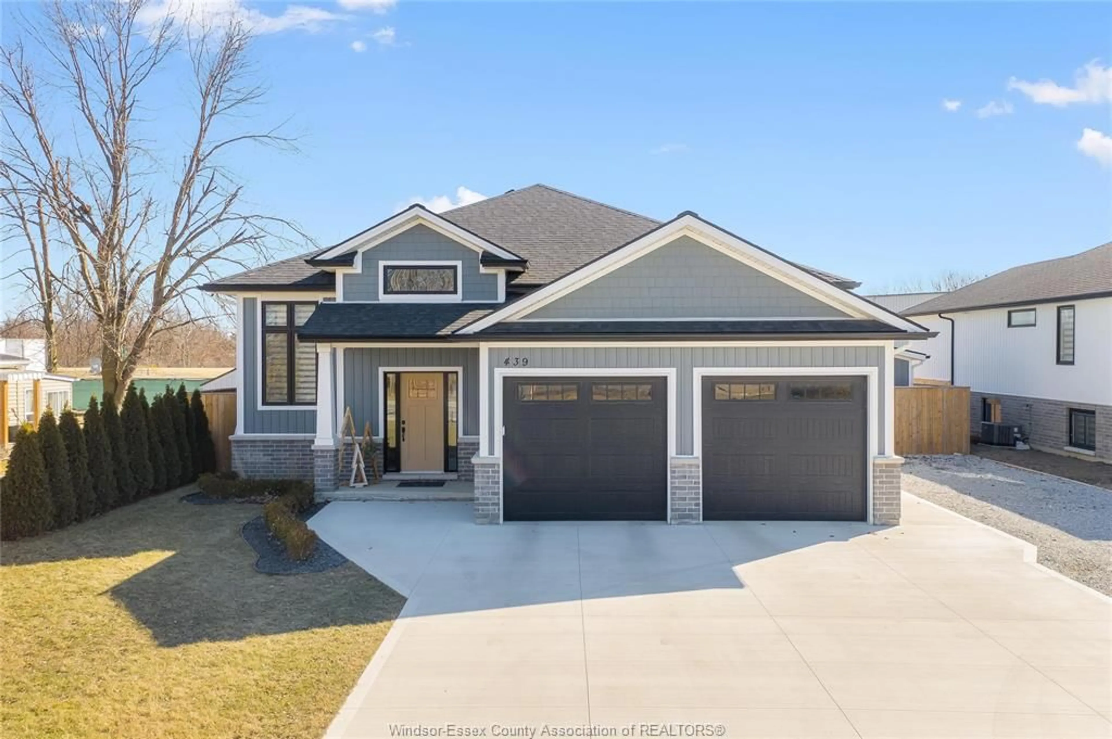 Home with vinyl exterior material, street for 439 ERIE St, Wheatley Ontario N0P 2P0