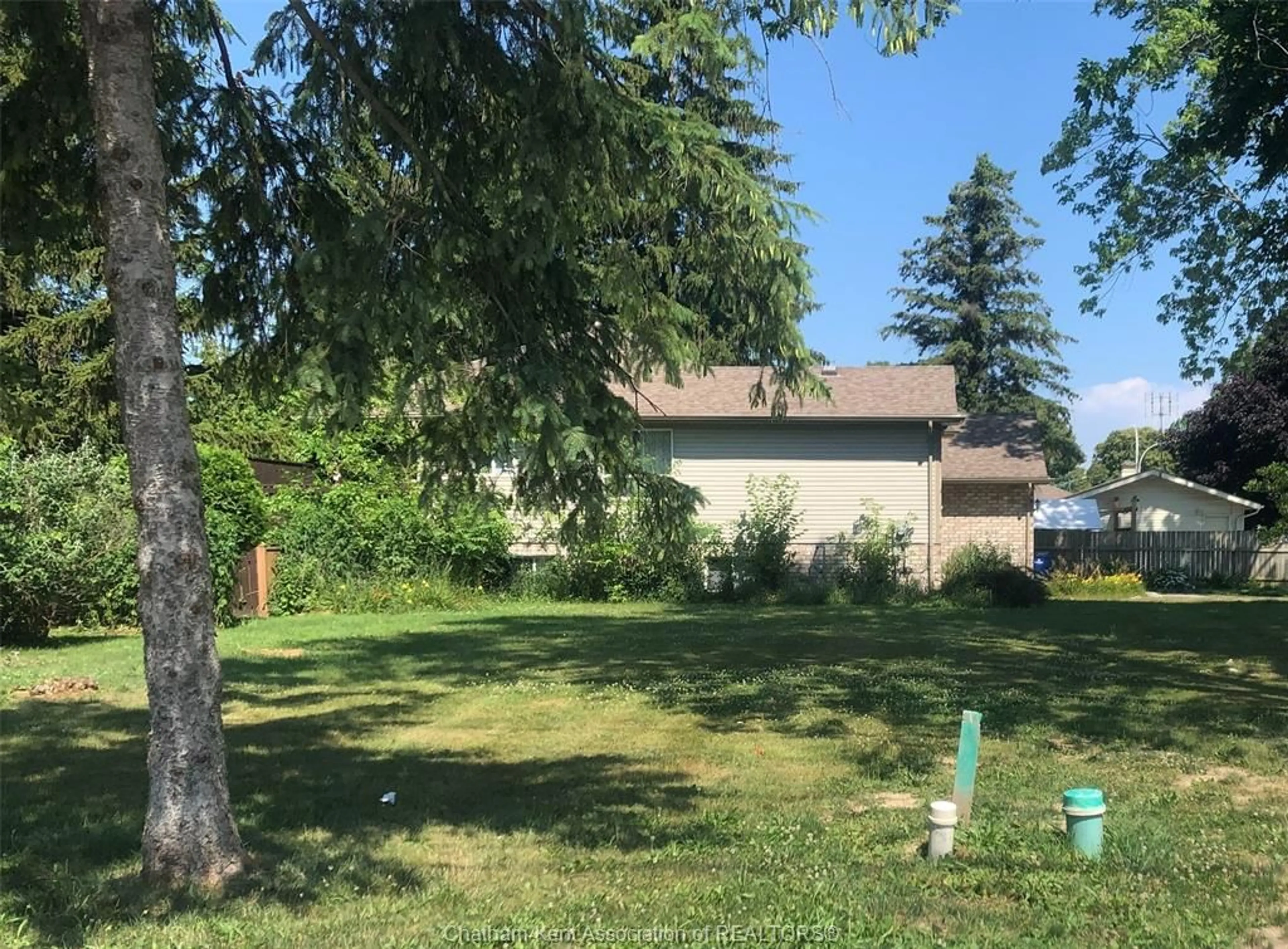 A pic from outside/outdoor area/front of a property/back of a property/a pic from drone, unknown for 24 St Michael Ave, Chatham Ontario N7M 2E4