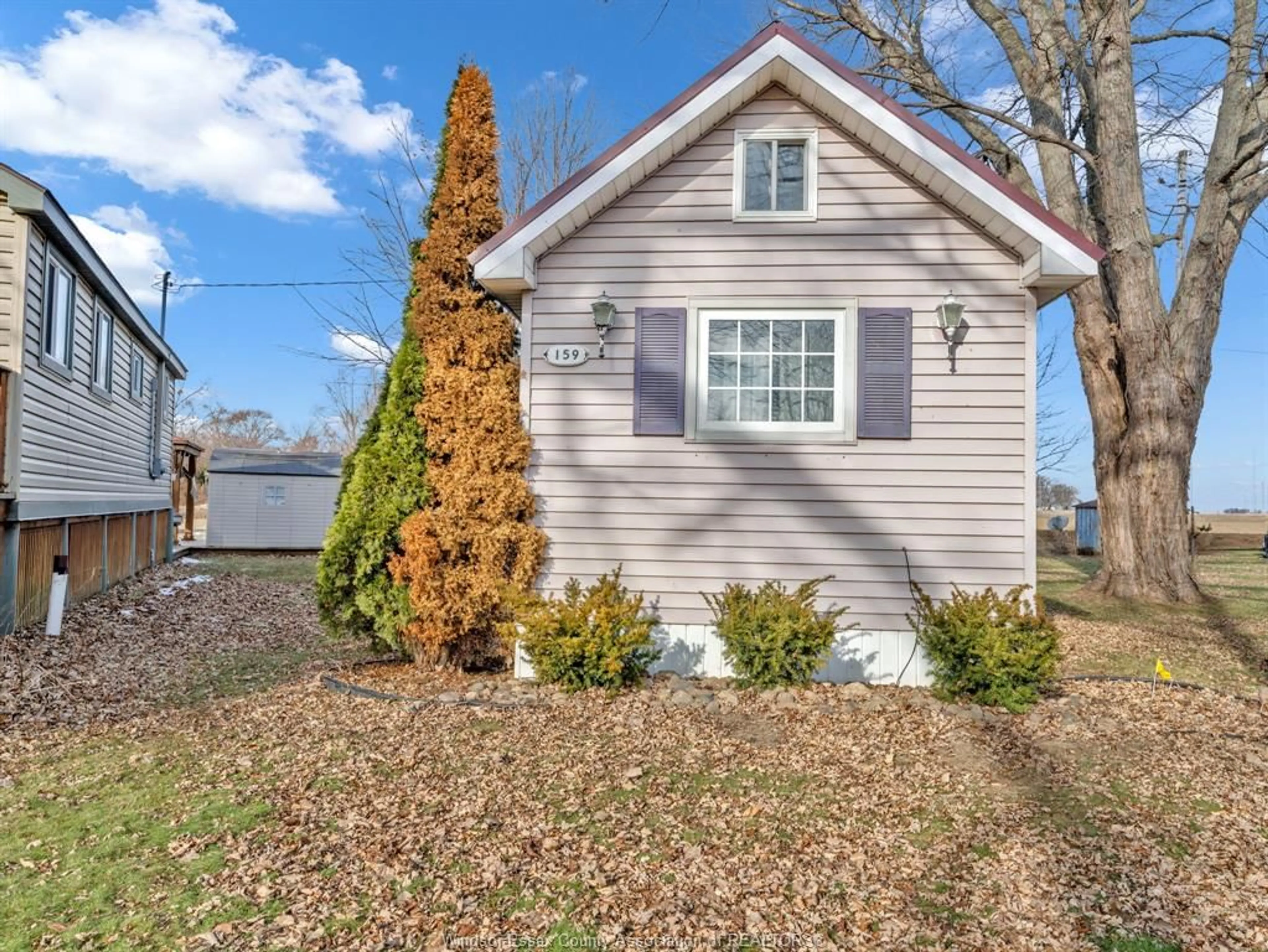 Home with vinyl exterior material, street for 159 AMBASSADOR BEACH Rd, Colchester Ontario N0R 1G0