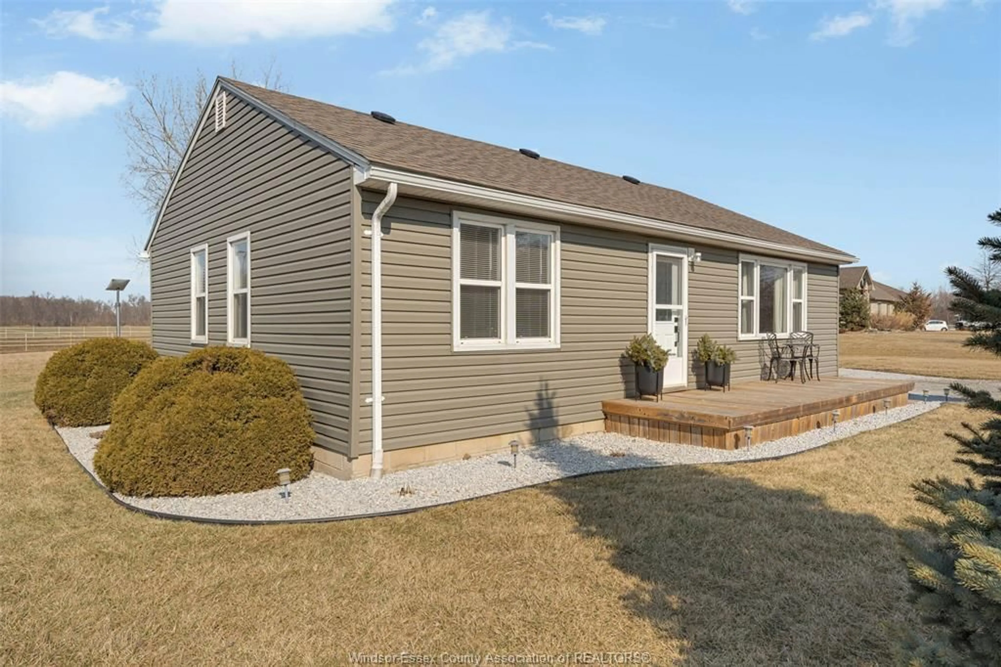 Home with vinyl exterior material, street for 9872 9TH CONCESSION Rd, Essex Ontario N8M 2X5