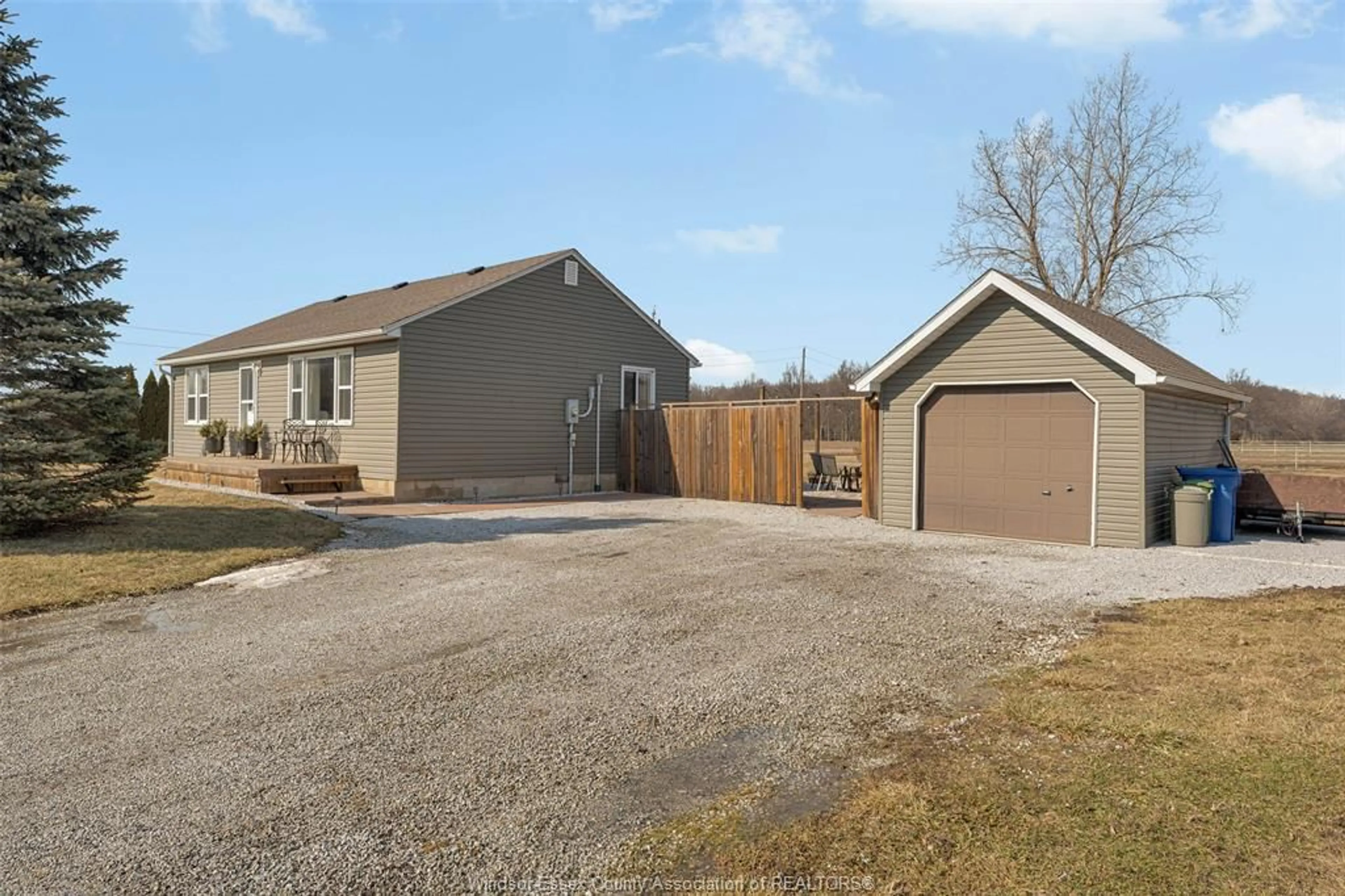 A pic from outside/outdoor area/front of a property/back of a property/a pic from drone, street for 9872 9TH CONCESSION Rd, Essex Ontario N8M 2X5