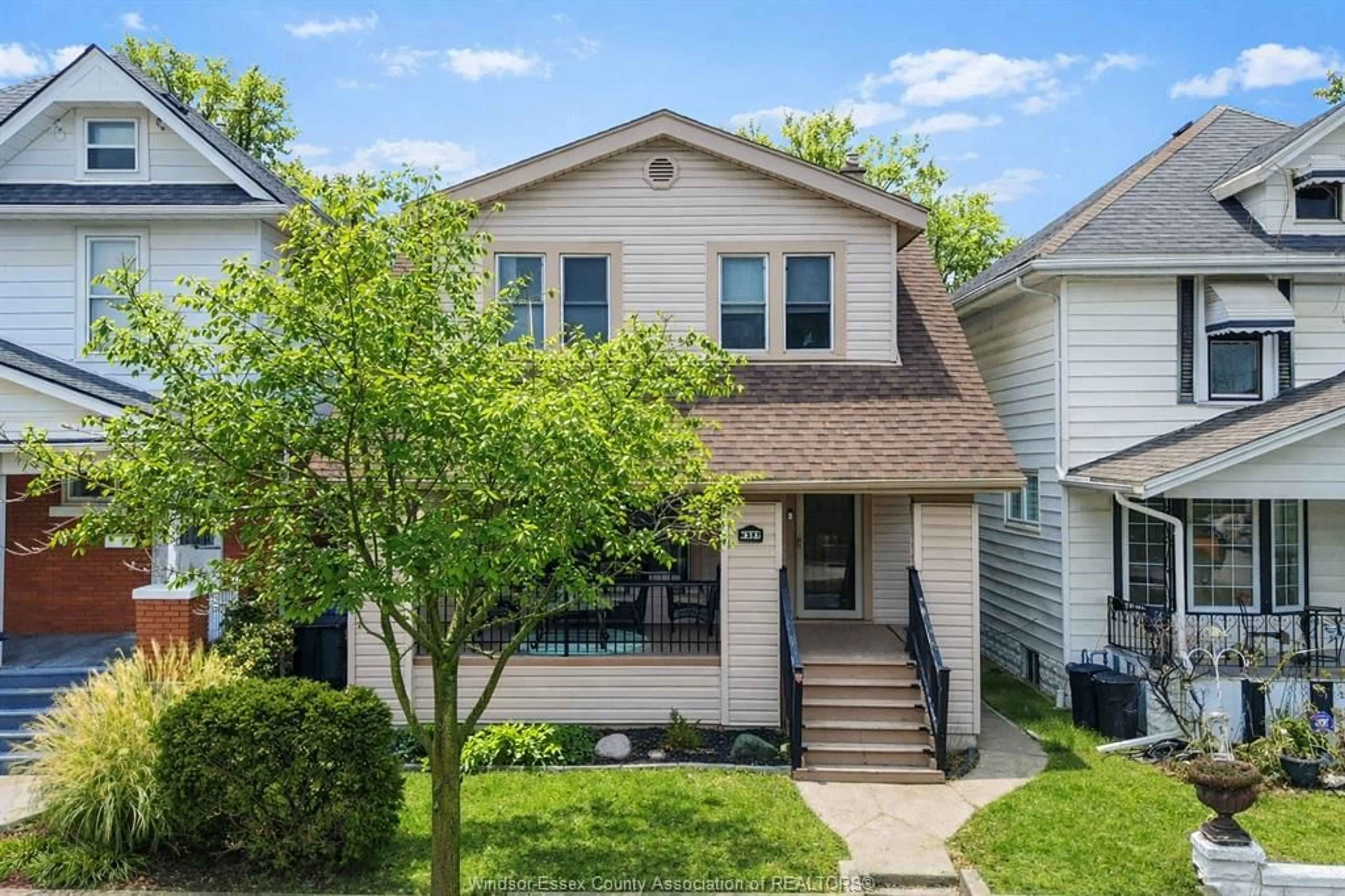 Home with vinyl exterior material, street for 1317 WINDERMERE, Windsor Ontario N8Y 3G1