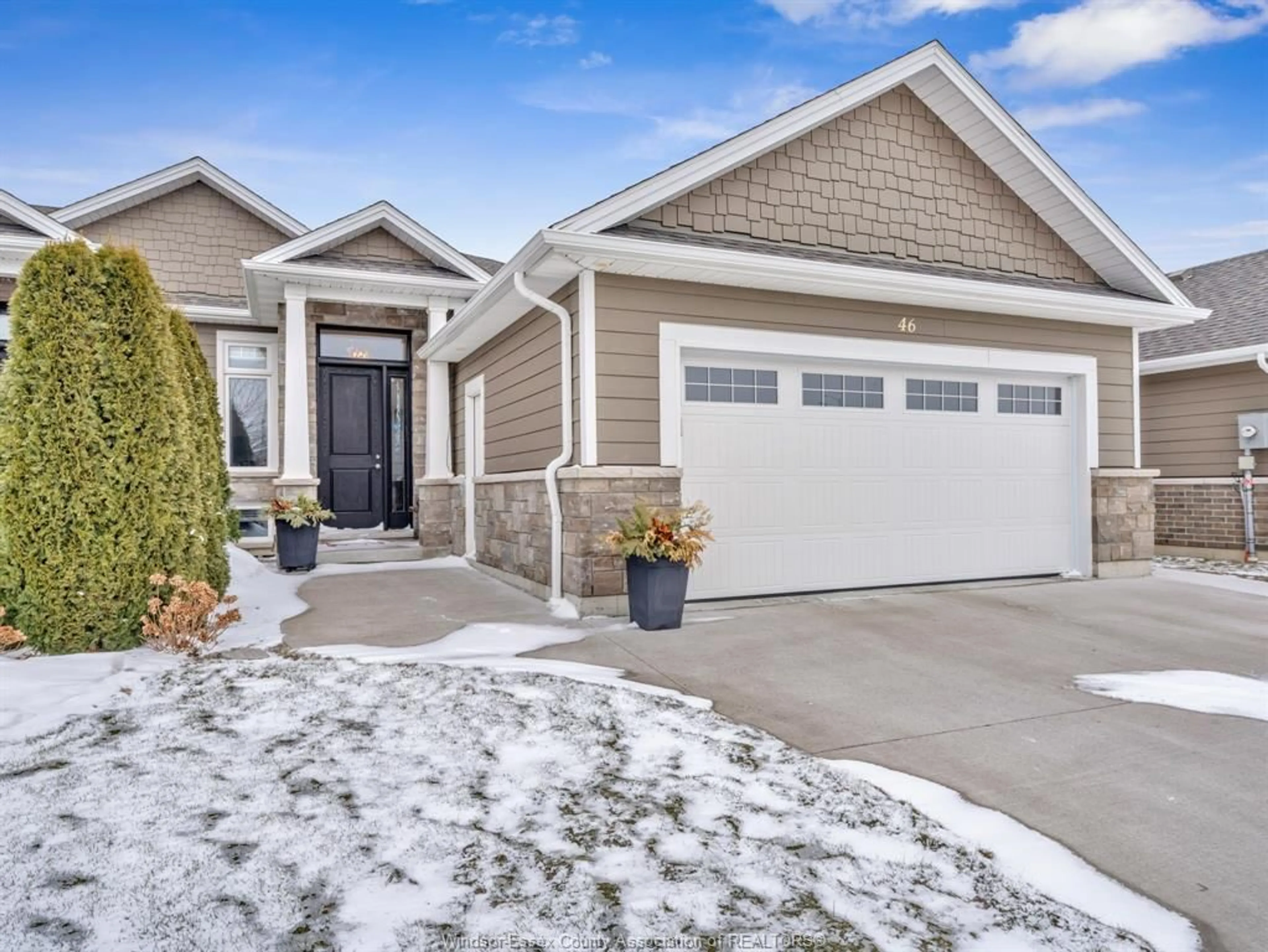 Home with vinyl exterior material, street for 46 DESTINY Dr, Leamington Ontario N8H 0E1