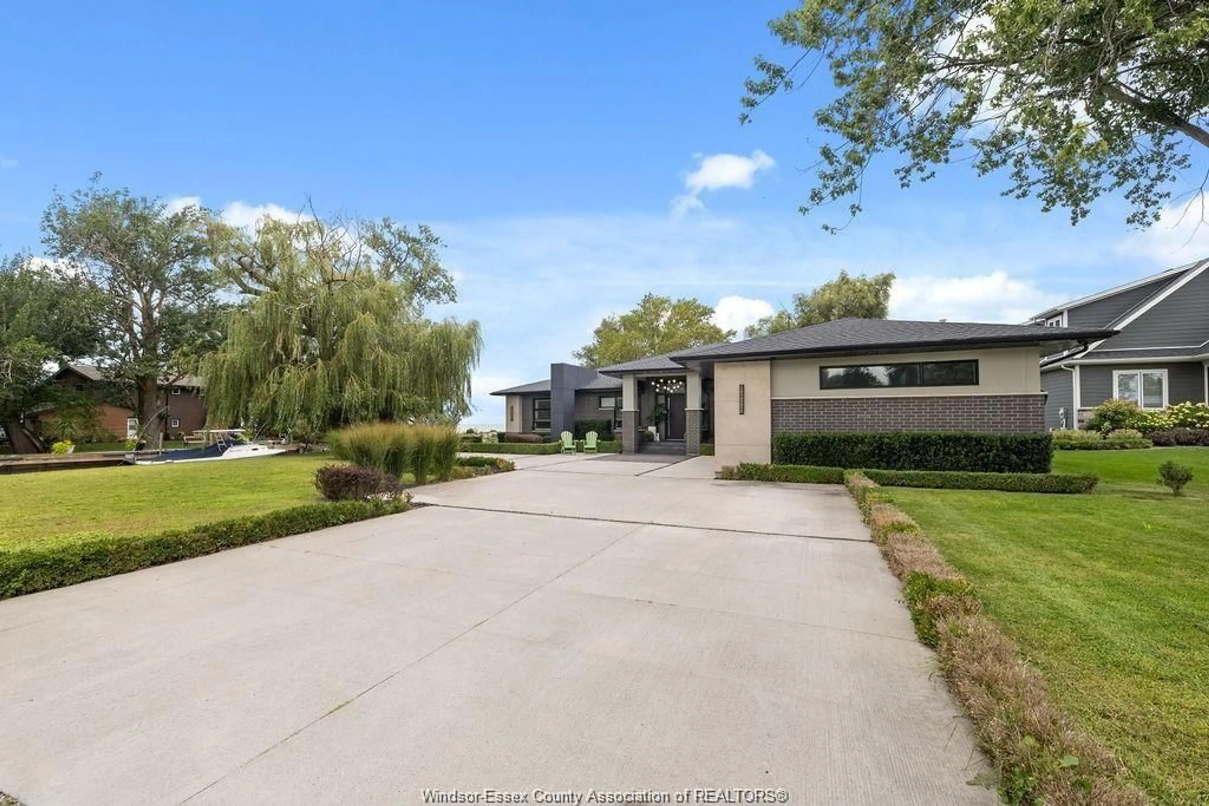 A pic from outside/outdoor area/front of a property/back of a property/a pic from drone, street for 551 ROSS BEACH Rd, Lakeshore Ontario N0R 1A0