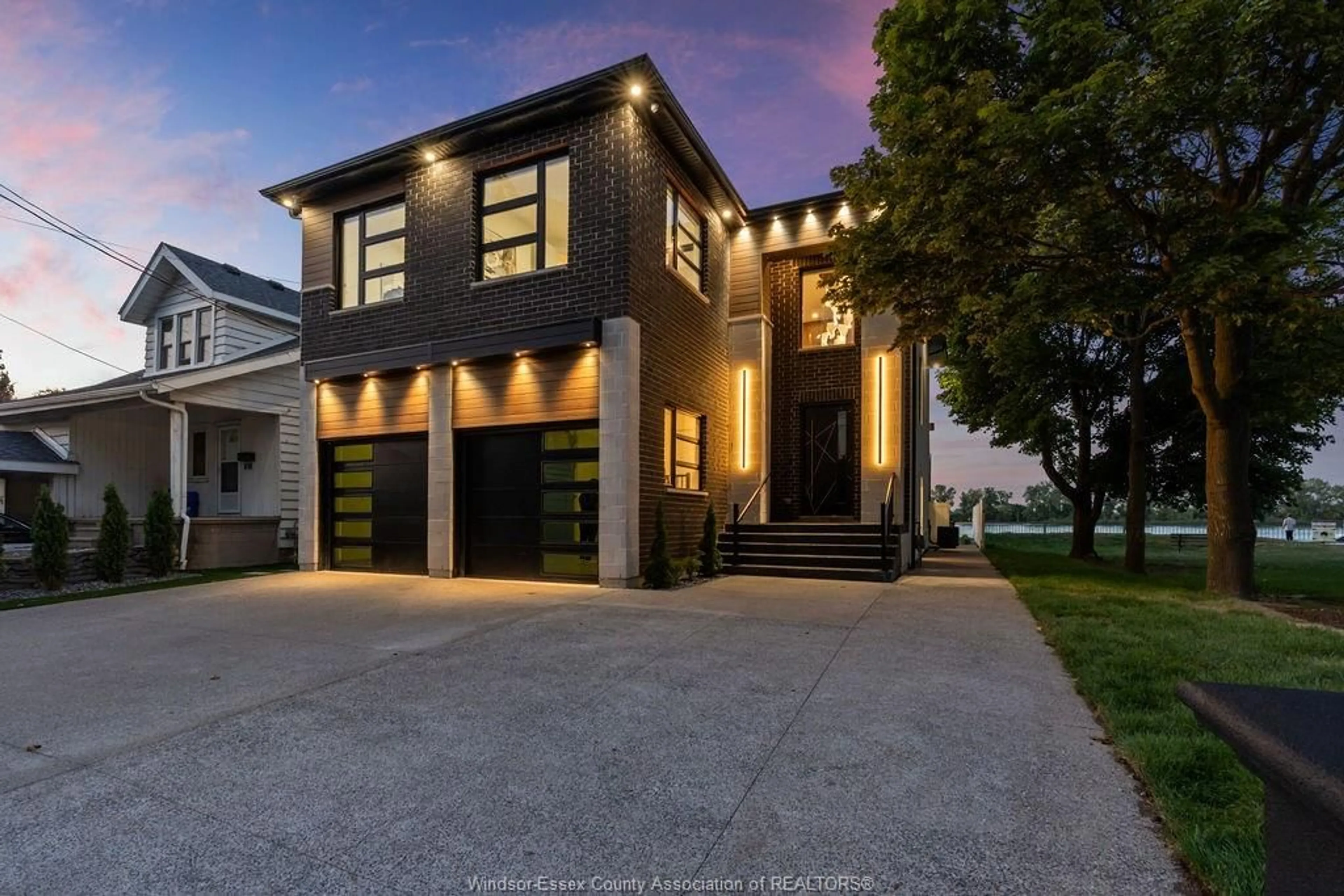 Home with brick exterior material, street for 8720 RIVERSIDE Dr, Windsor Ontario N8S 1E9