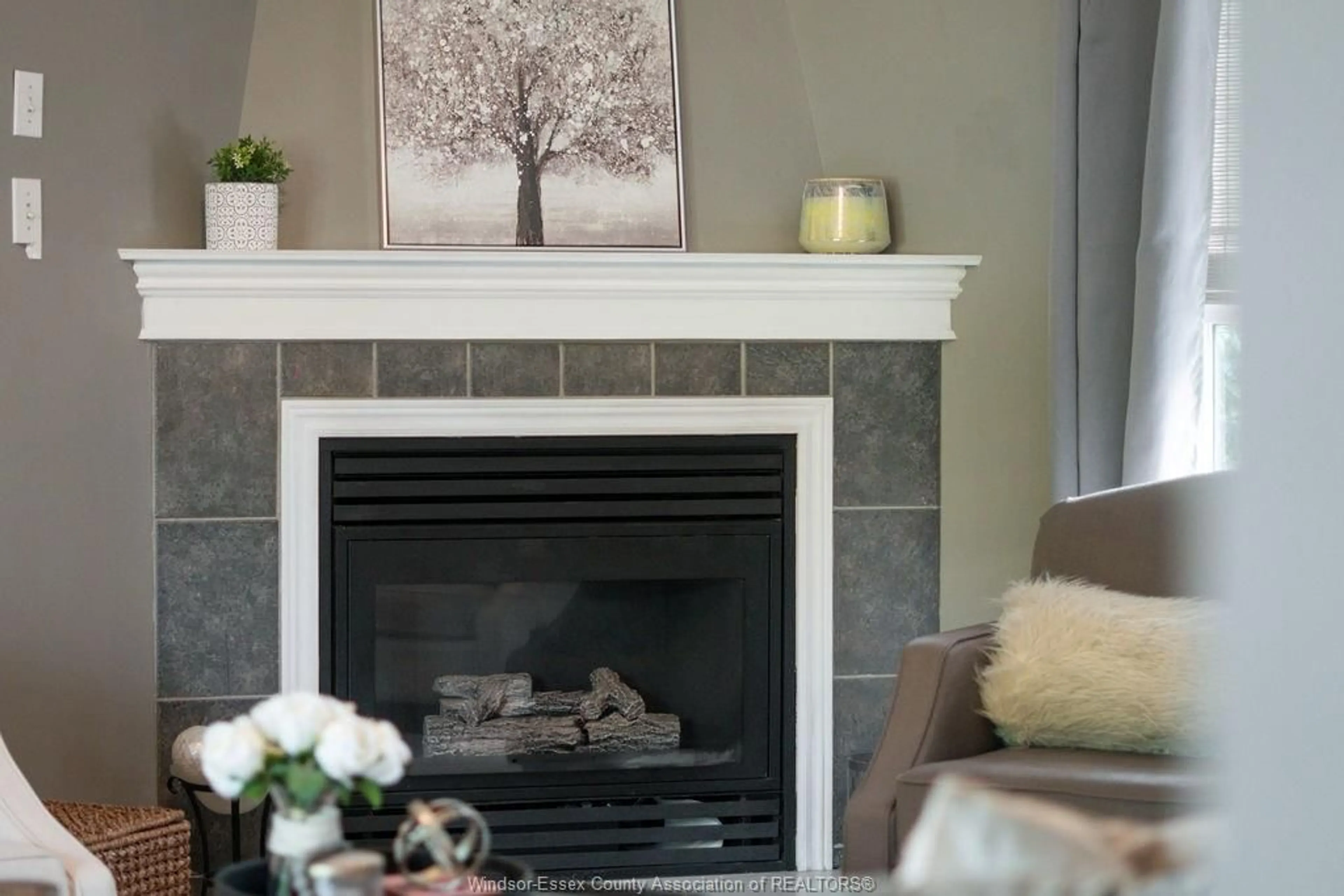 Living room with furniture, ceramic/tile floor for 329 GERALDINE Cres, Windsor Ontario N9E 4R7