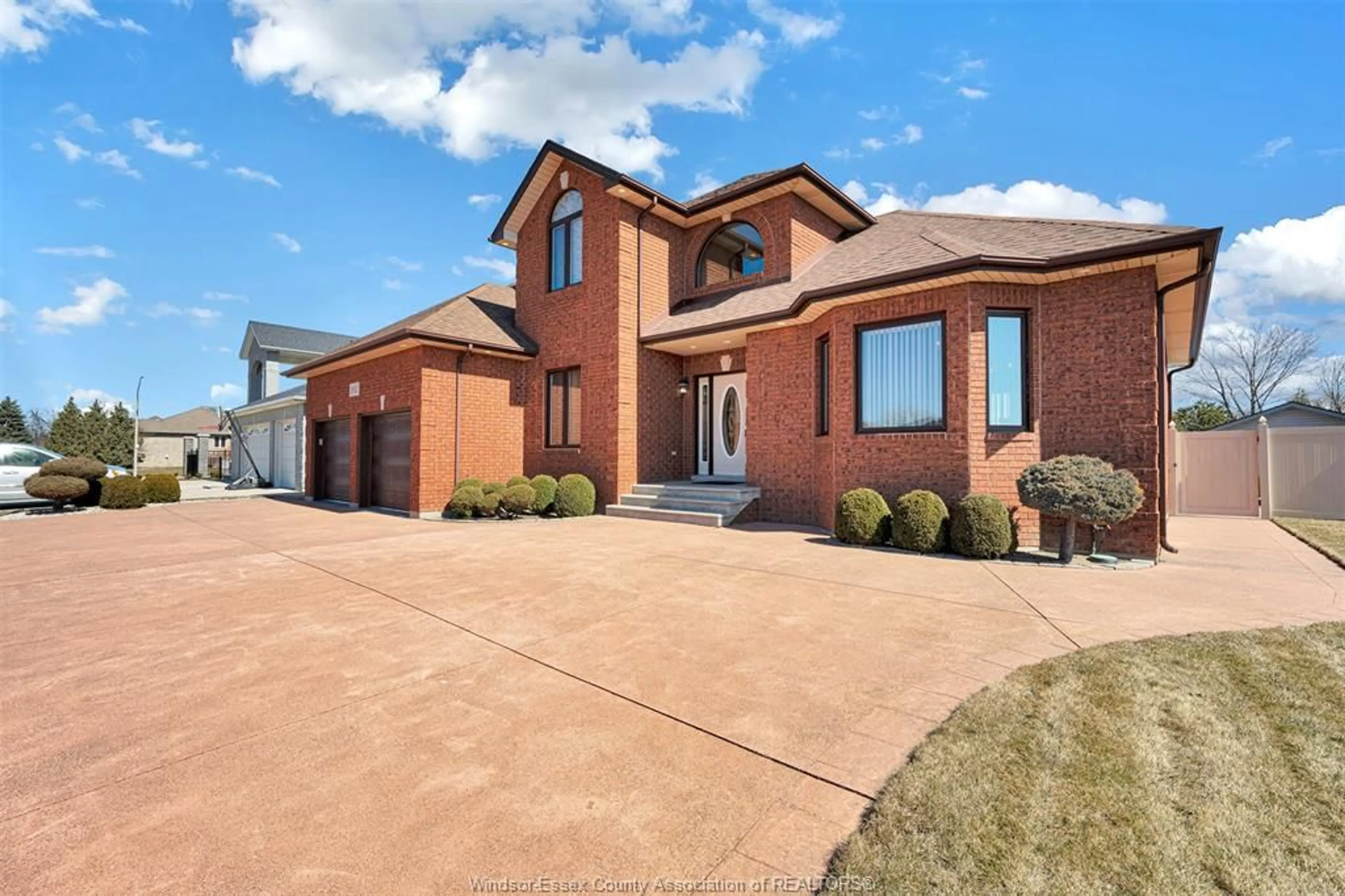 Home with brick exterior material, street for 1912 CORBI Lane, Tecumseh Ontario N8N 5C8