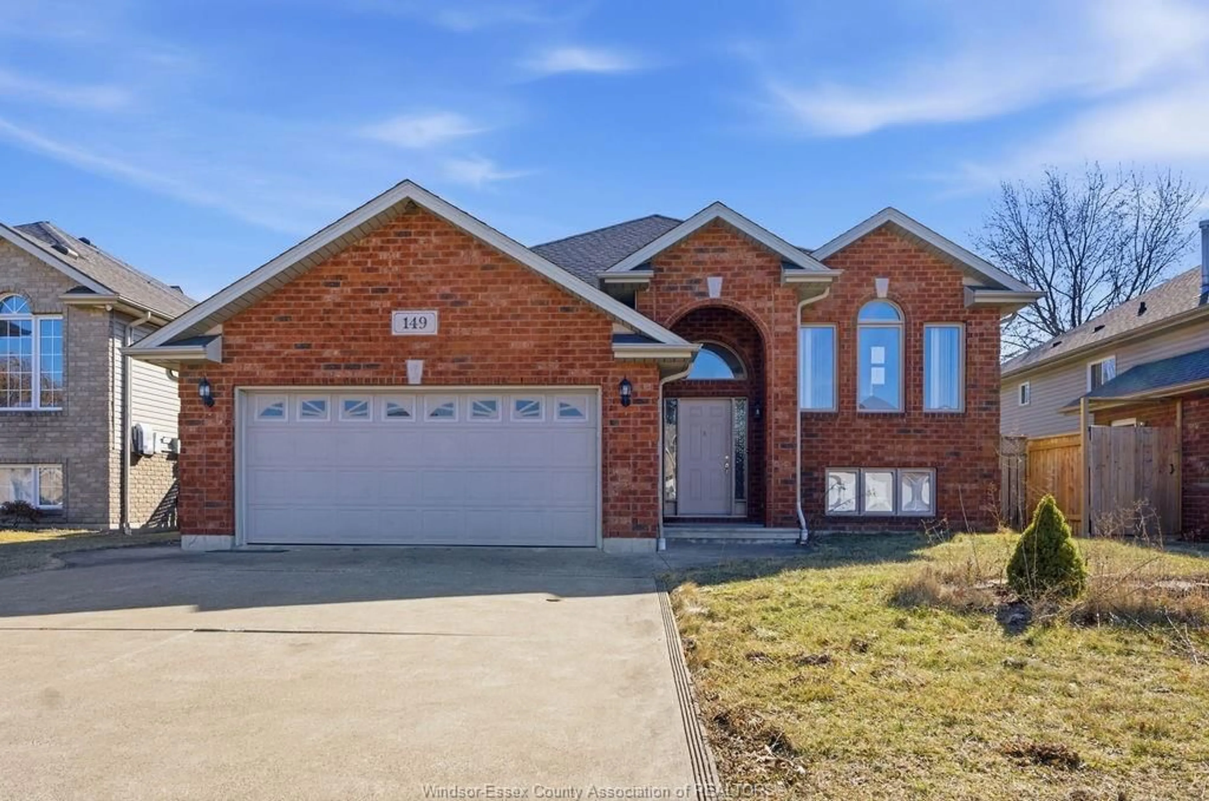 Home with brick exterior material, street for 149 AMY CROFT Dr, Lakeshore Ontario N8K 1E3
