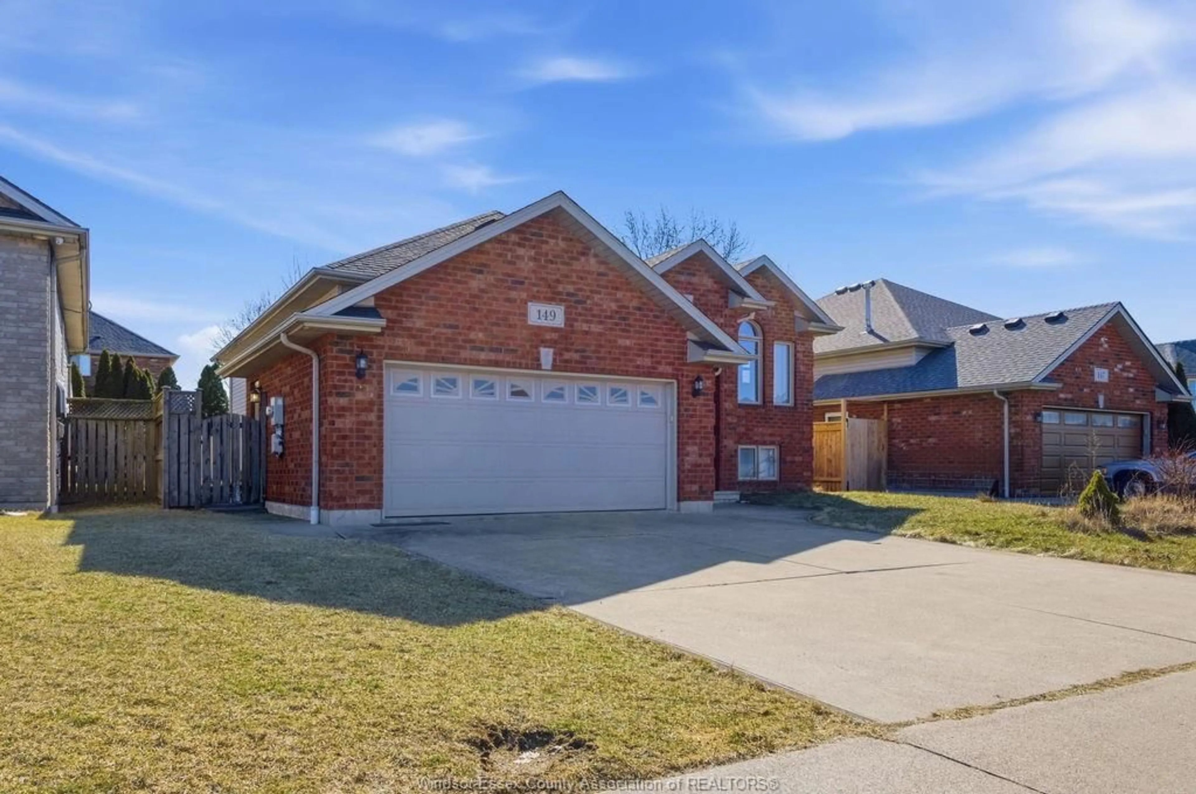 Home with brick exterior material, street for 149 AMY CROFT Dr, Lakeshore Ontario N8K 1E3