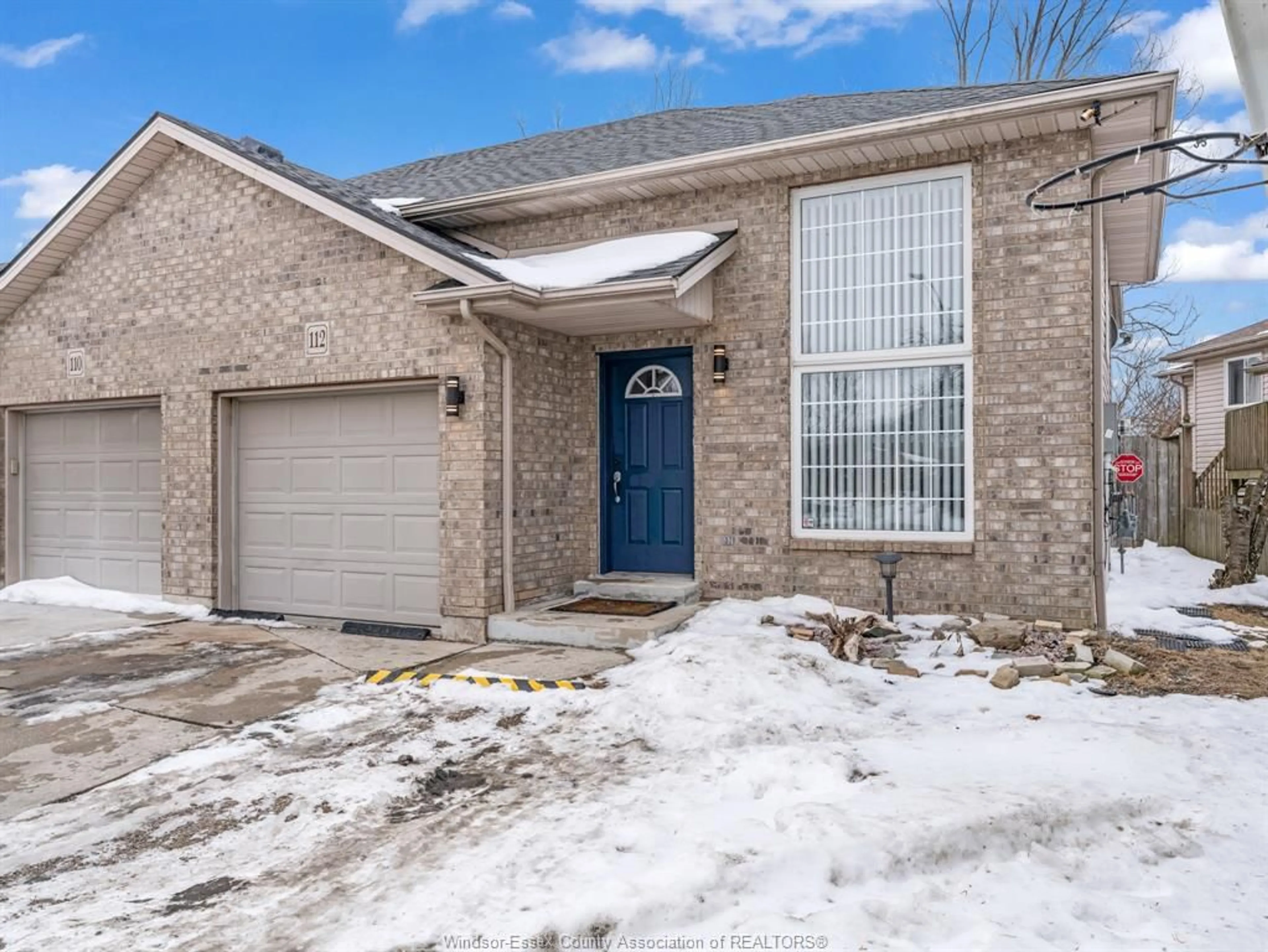 Home with brick exterior material, street for 112 SUTTON Dr, Leamington Ontario N8H 5K5