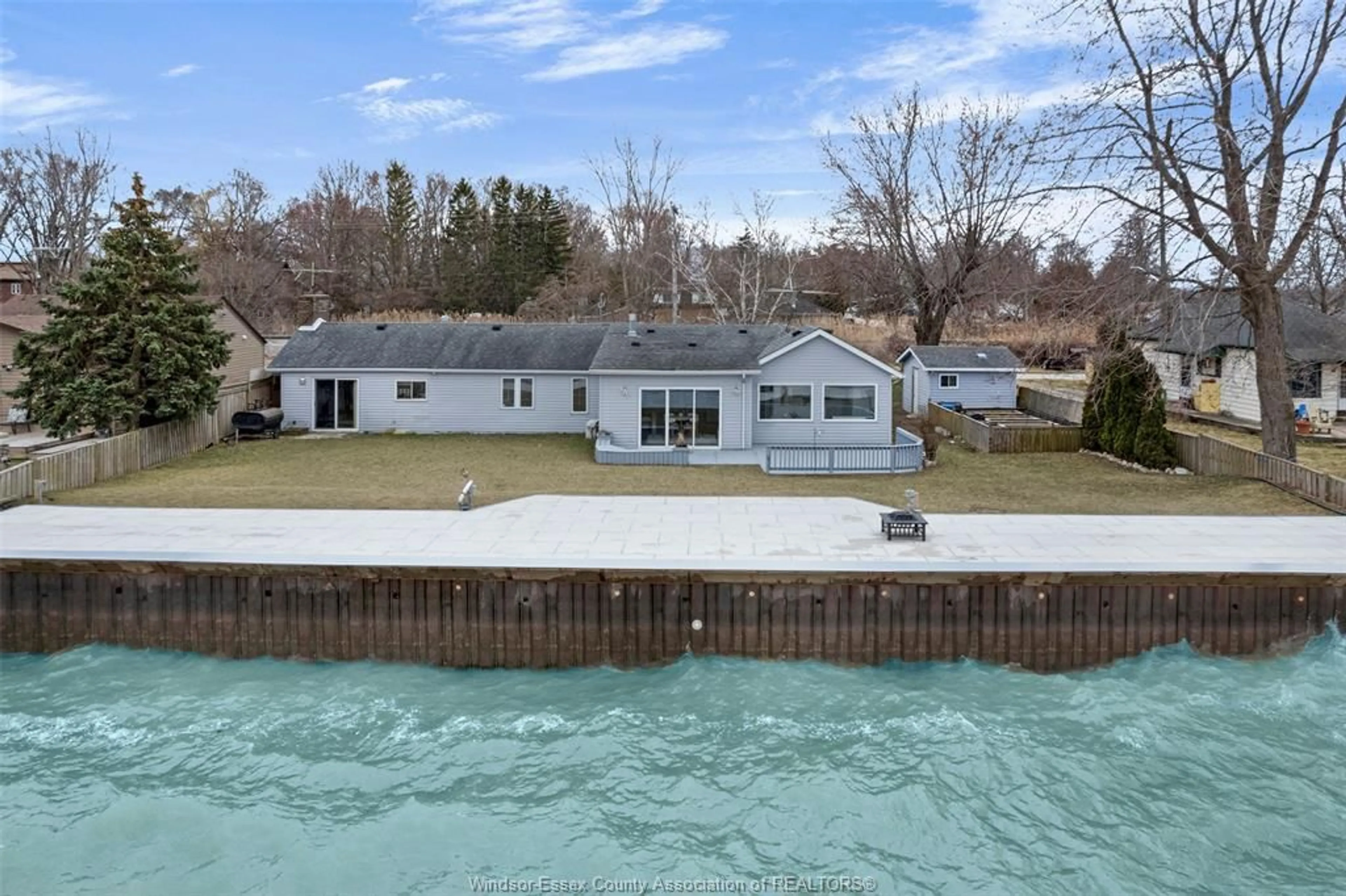 A pic from outside/outdoor area/front of a property/back of a property/a pic from drone, water/lake/river/ocean view for 1486 Caille Ave., Lakeshore Ontario N0R 1A0