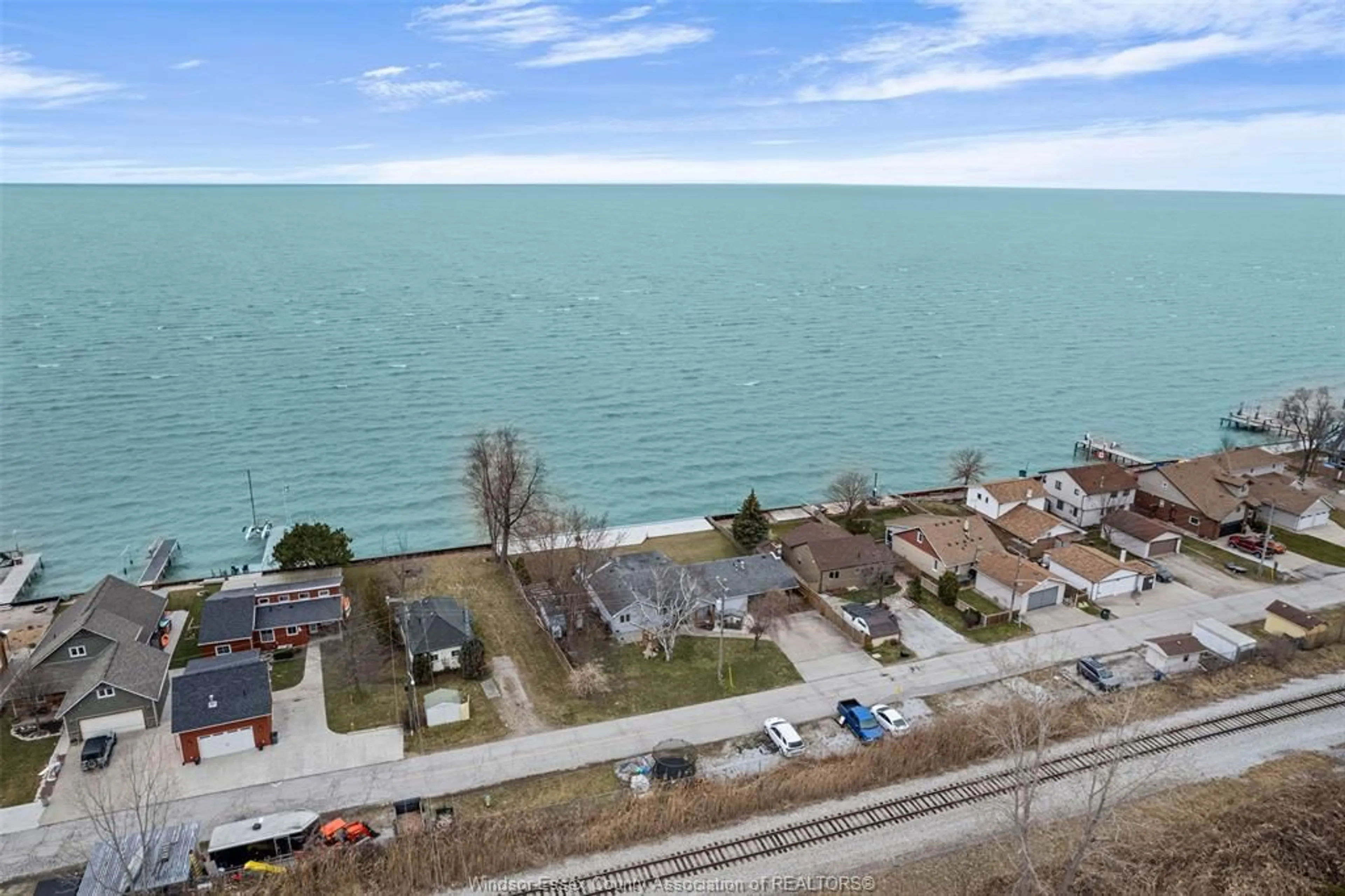 A pic from outside/outdoor area/front of a property/back of a property/a pic from drone, water/lake/river/ocean view for 1486 Caille Ave., Lakeshore Ontario N0R 1A0