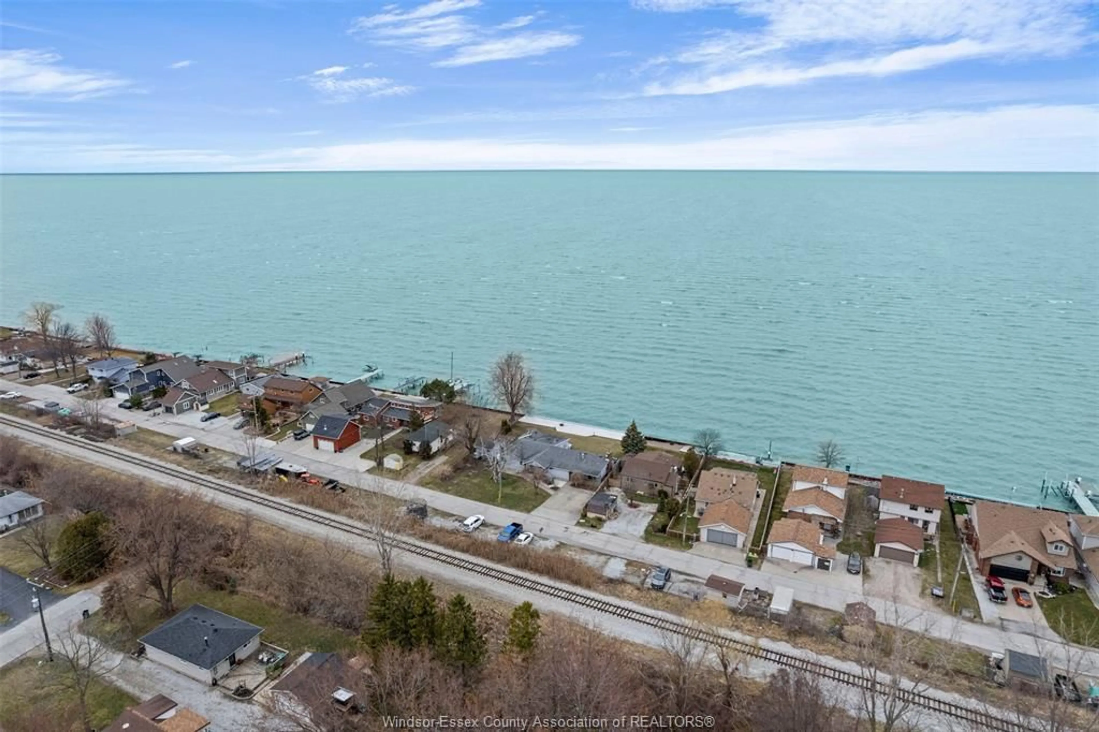A pic from outside/outdoor area/front of a property/back of a property/a pic from drone, water/lake/river/ocean view for 1486 Caille Ave., Lakeshore Ontario N0R 1A0