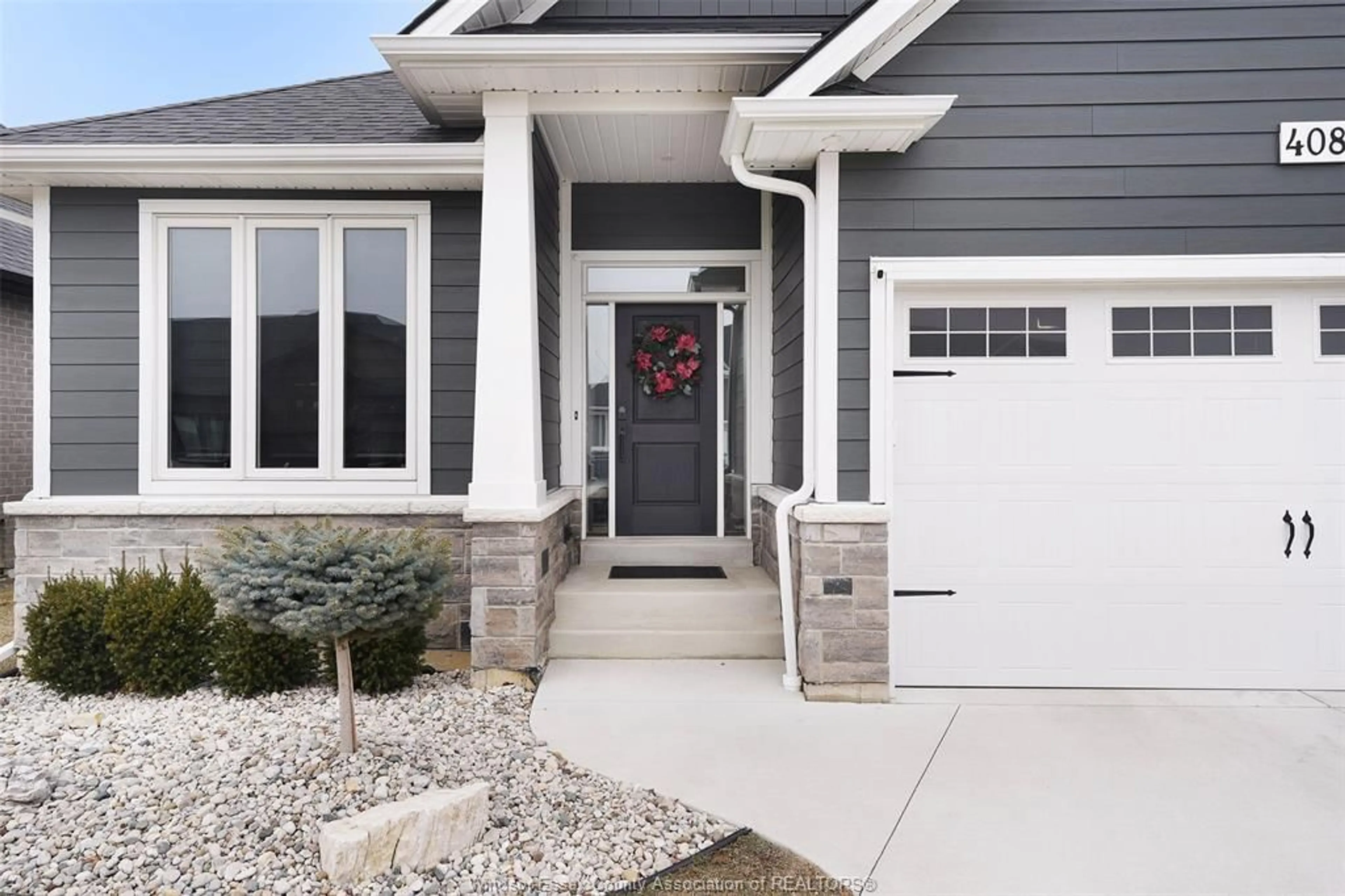 Home with vinyl exterior material, street for 408 MATESE, Lakeshore Ontario N0R 1A0