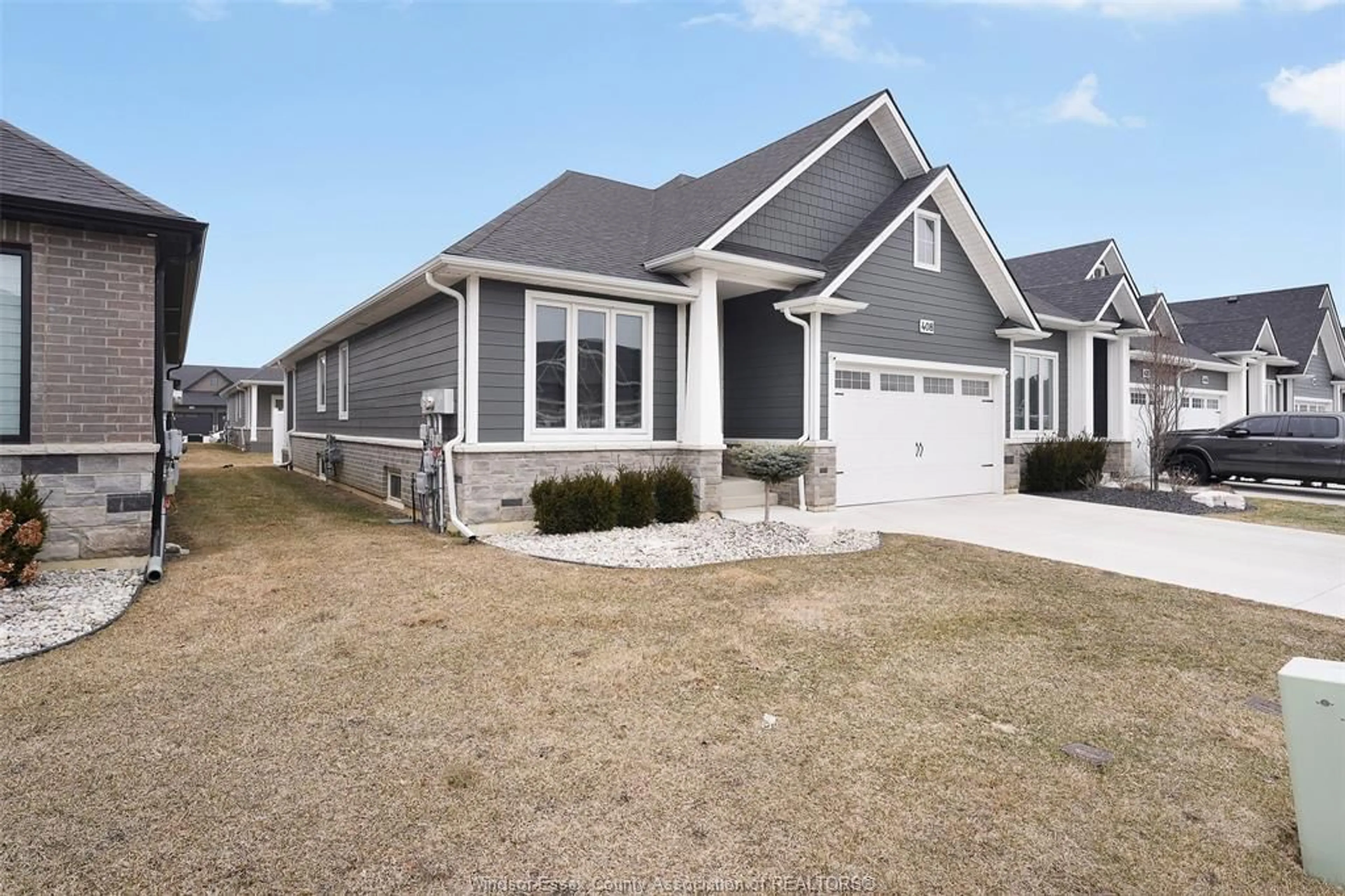 Home with vinyl exterior material, street for 408 MATESE, Lakeshore Ontario N0R 1A0