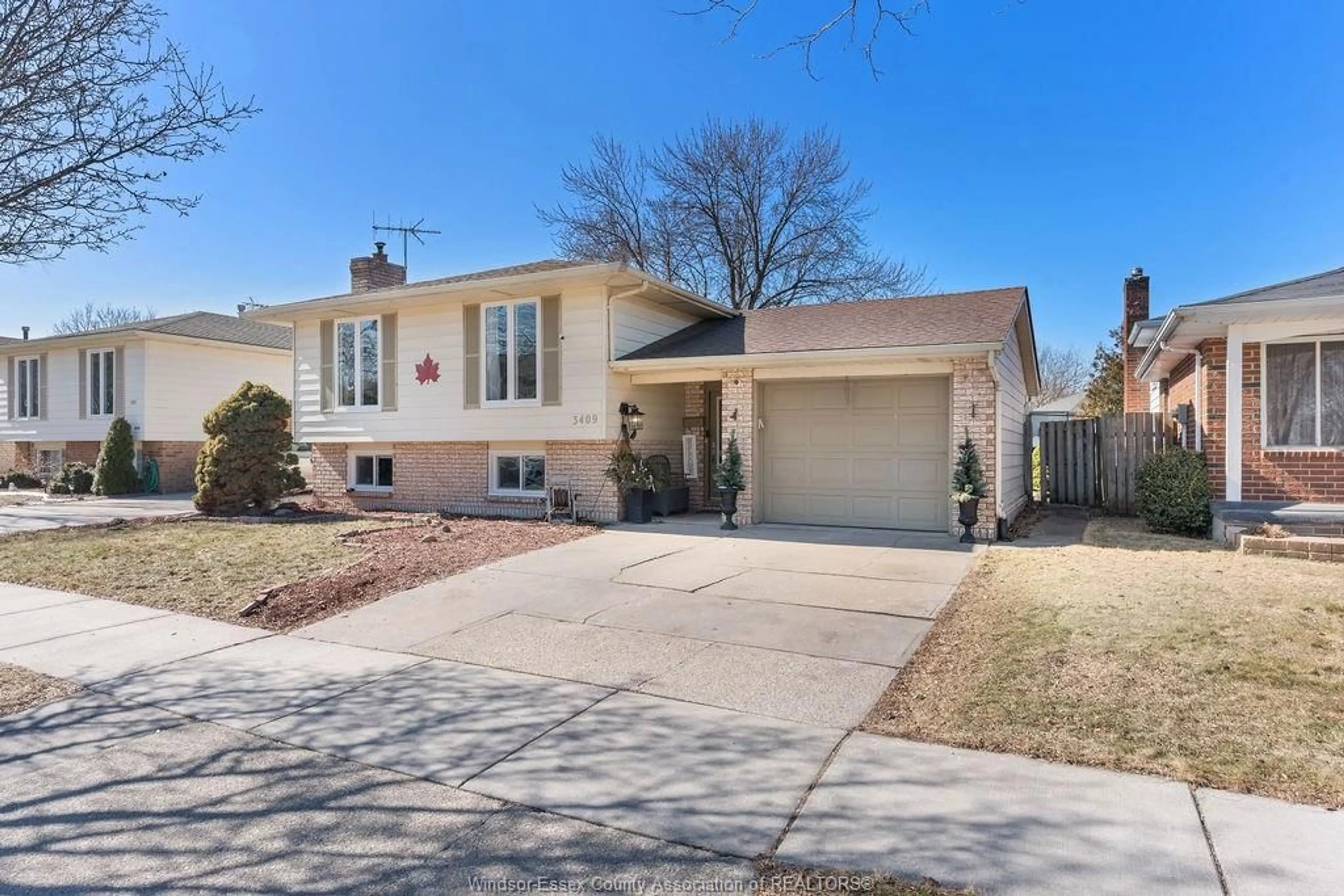 Home with brick exterior material, street for 3409 DEERBROOK Dr, Windsor Ontario N8R 2G1