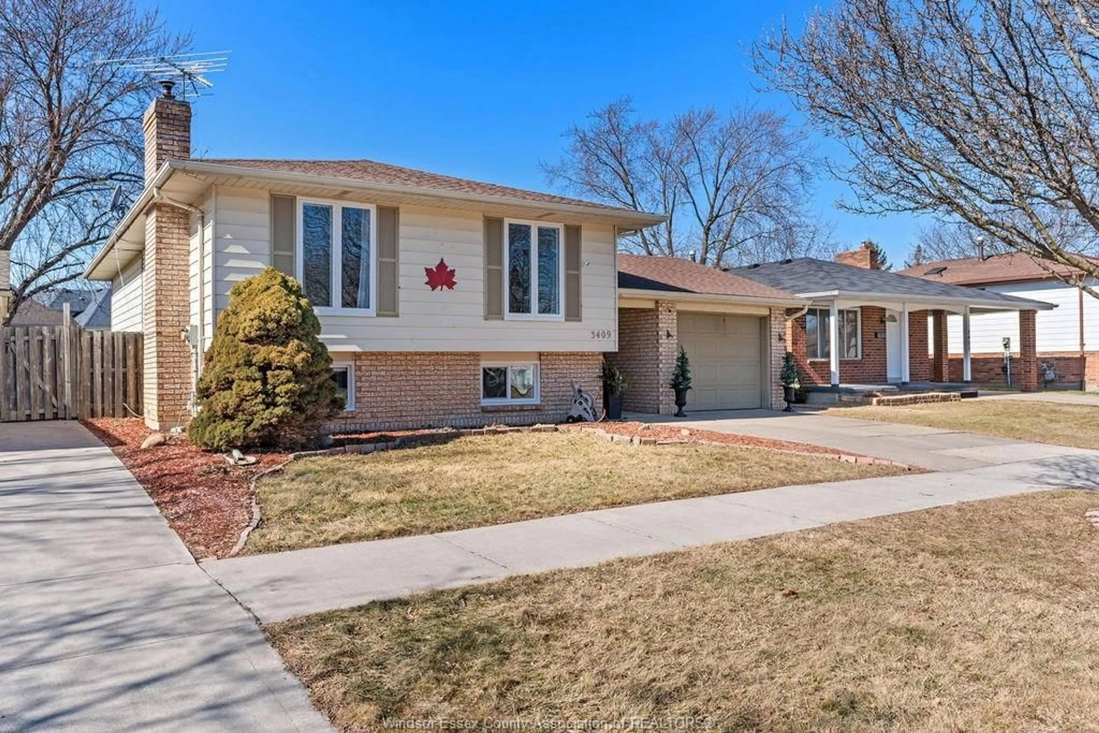 Home with brick exterior material, street for 3409 DEERBROOK Dr, Windsor Ontario N8R 2G1