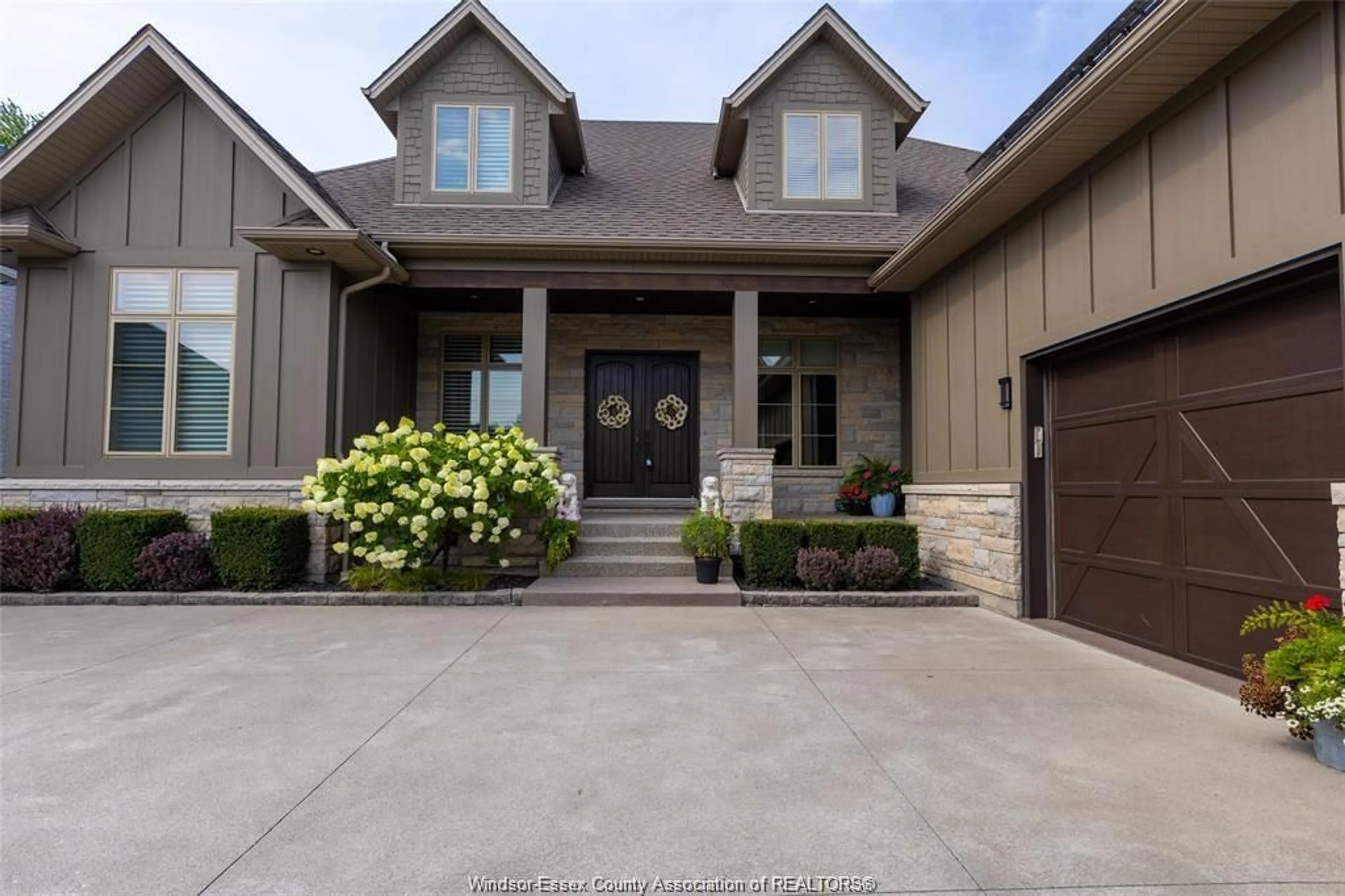 Home with brick exterior material, street for 12082 & 12078 Riverside Dr, Tecumseh Ontario N8P 1A9