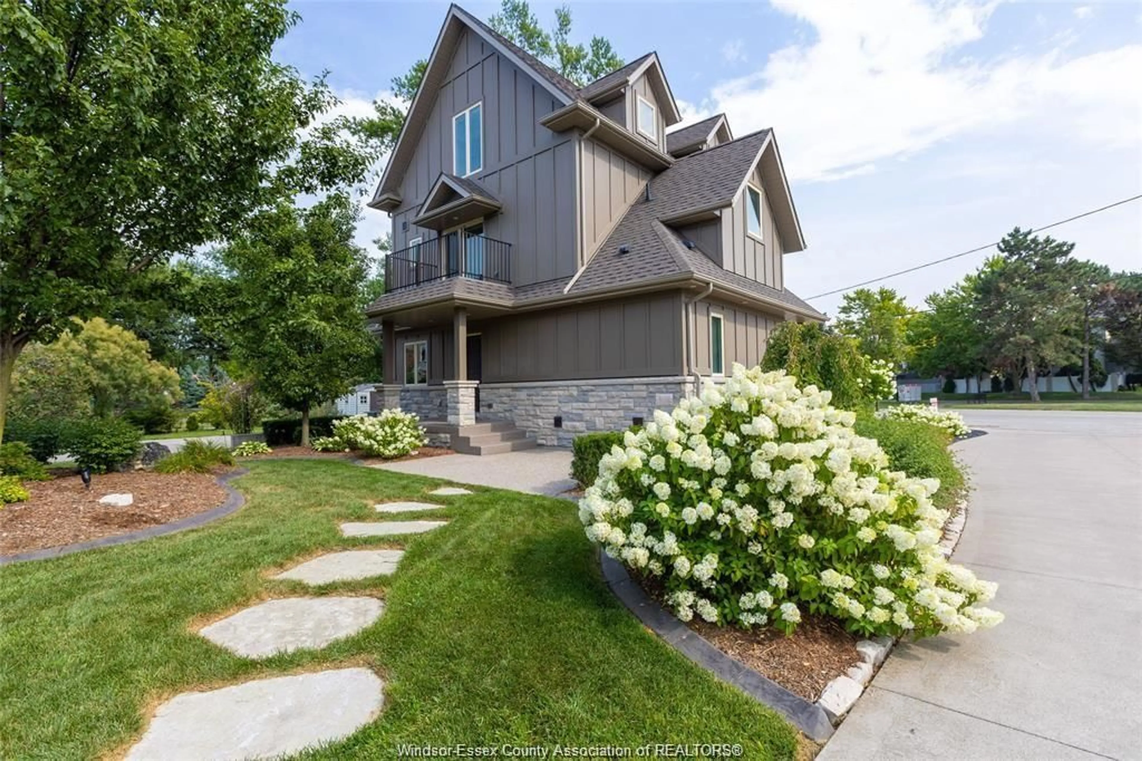 Home with brick exterior material, street for 12082 & 12078 Riverside Dr, Tecumseh Ontario N8P 1A9