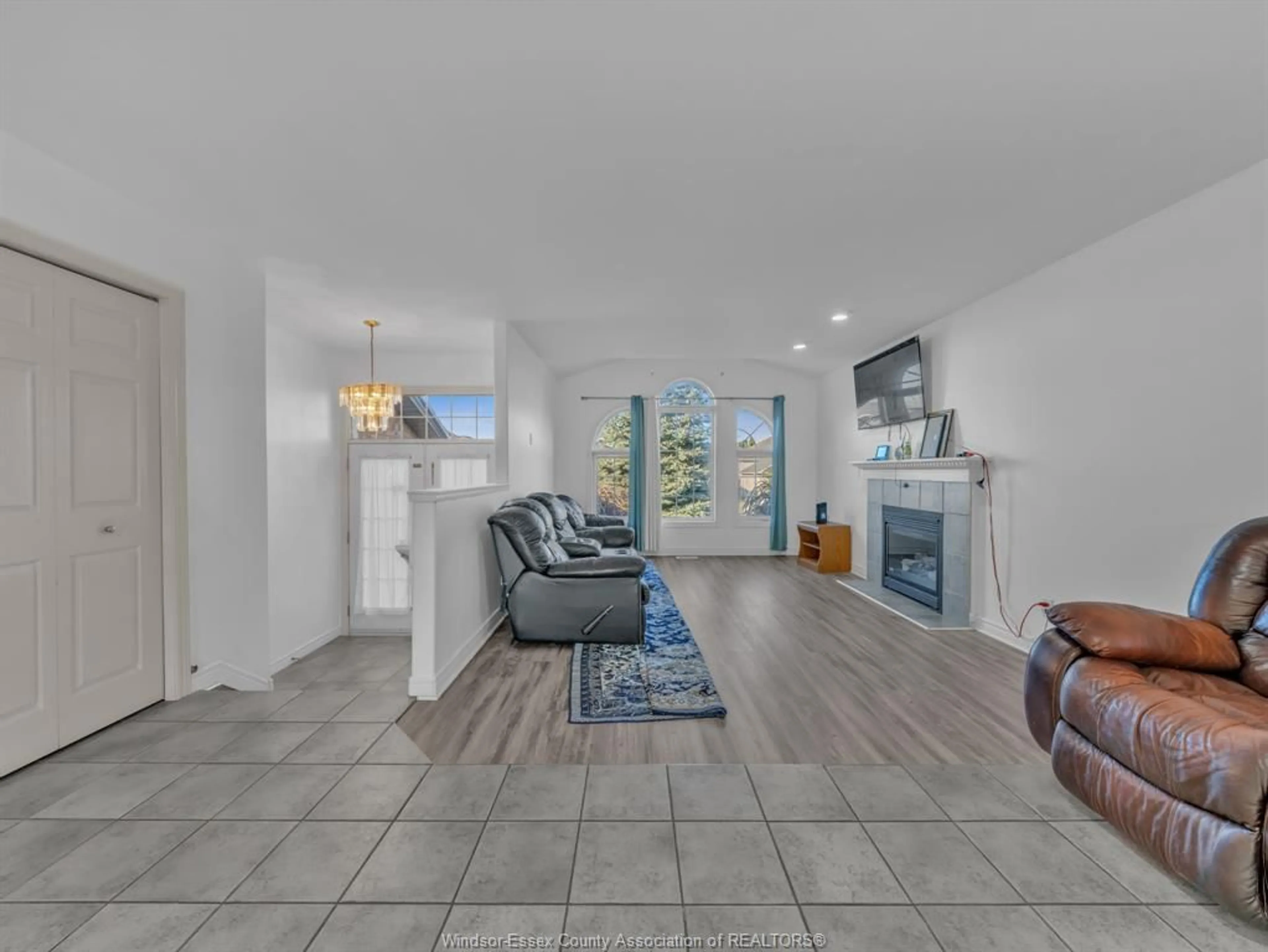 Living room with furniture, ceramic/tile floor for 40 Sandy Lake Dr, Leamington Ontario N8H 5K4