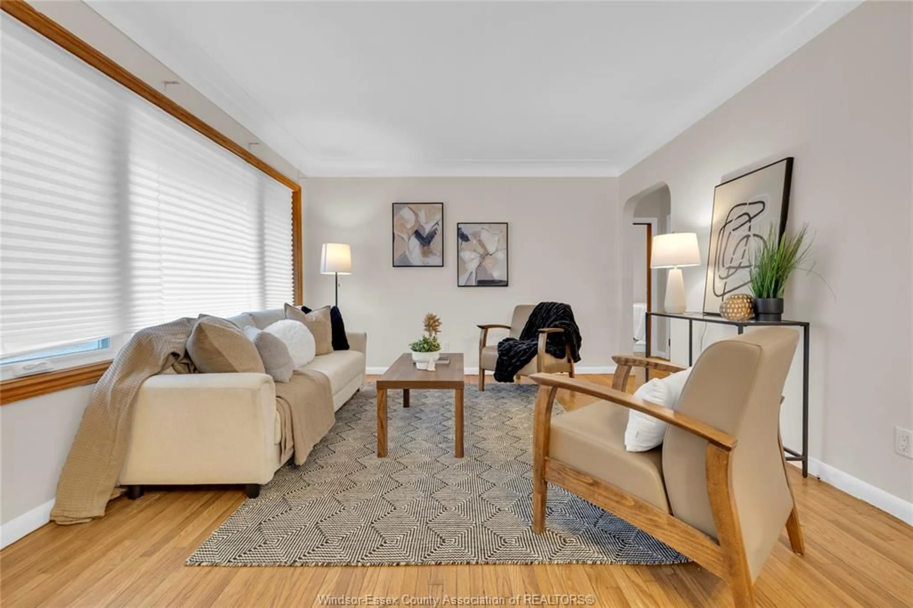 Living room with furniture, wood/laminate floor for 987 VICTORY, LaSalle Ontario N9J 1W2