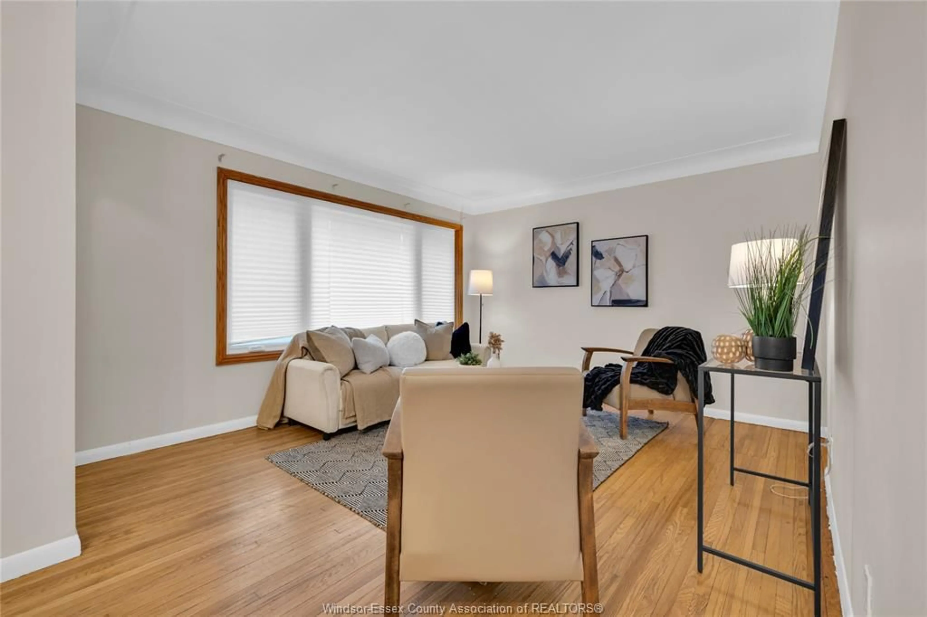 Living room with furniture, wood/laminate floor for 987 VICTORY, LaSalle Ontario N9J 1W2