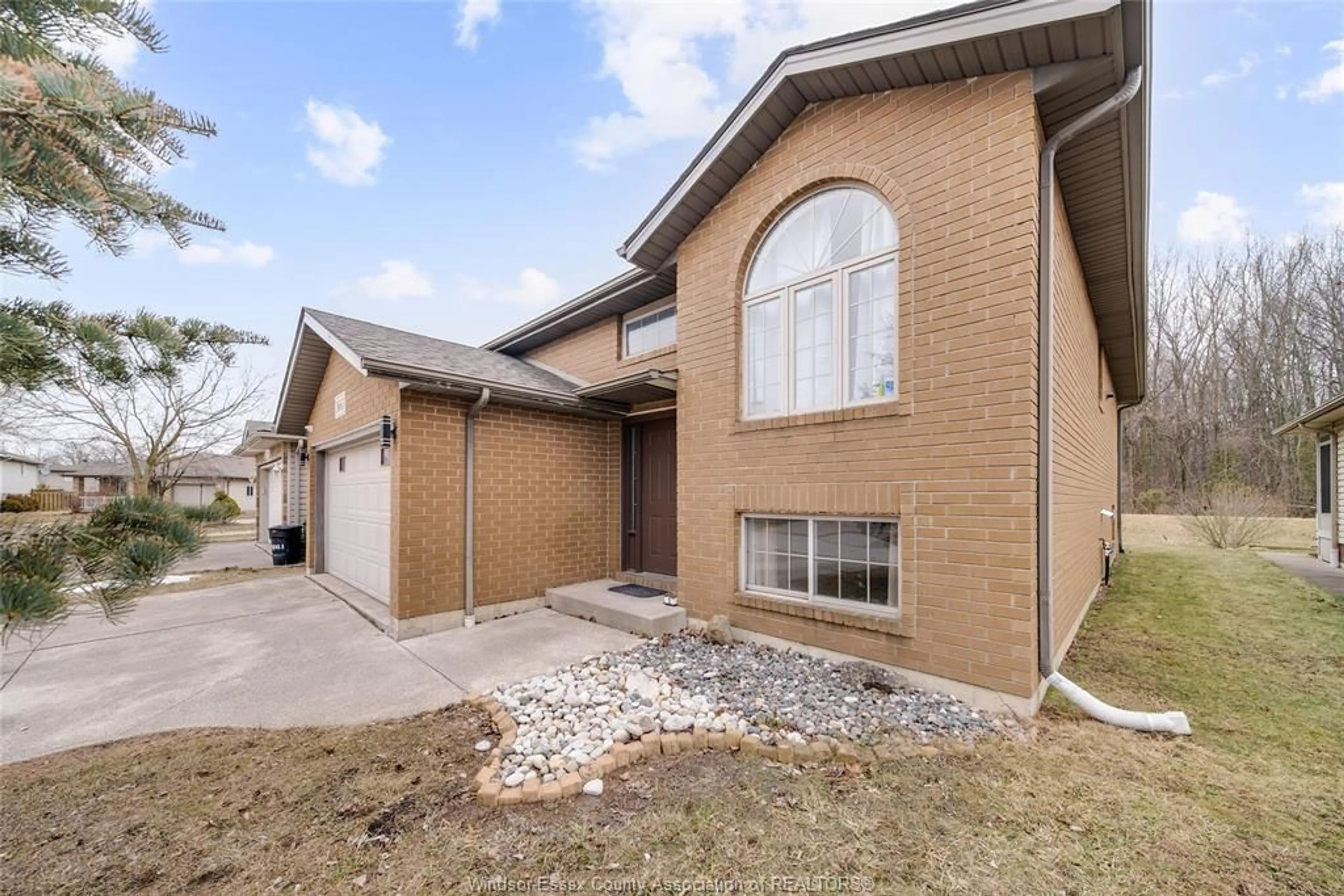 Home with brick exterior material, street for 3665 SHINGLECREEK Crt, Windsor Ontario N8W 5T7