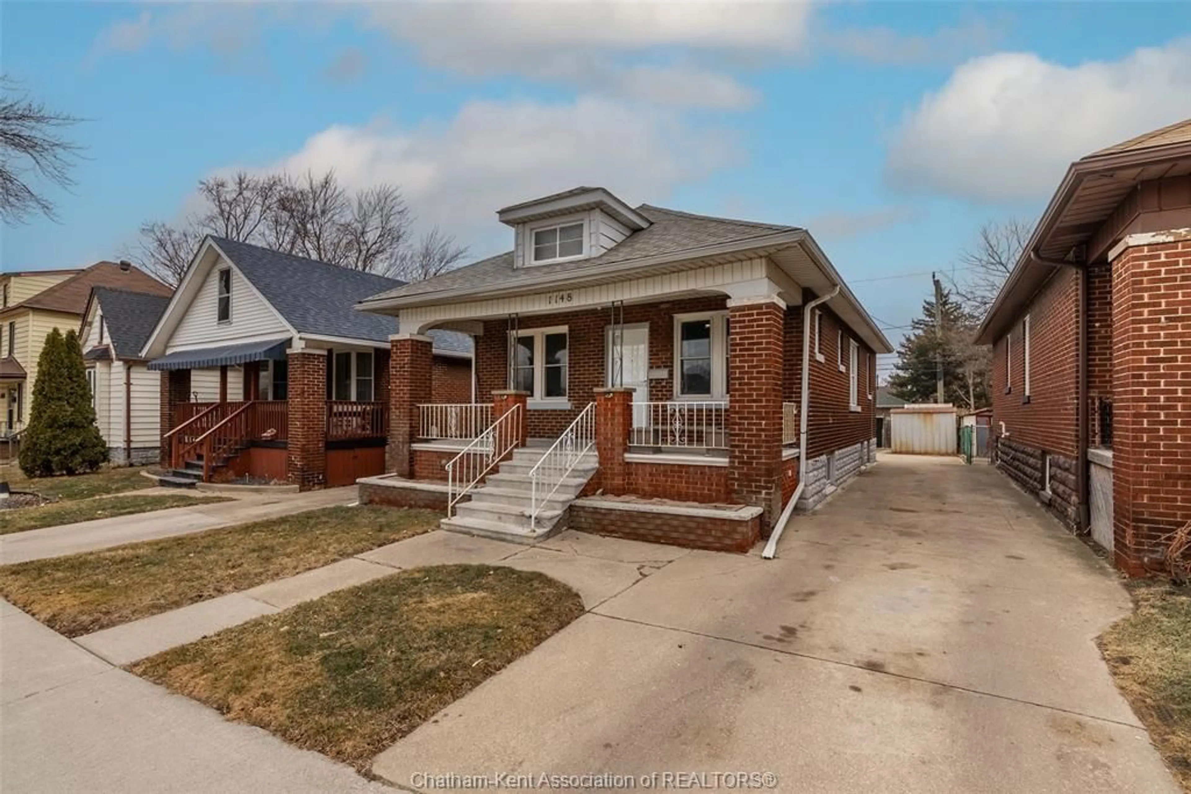 Home with brick exterior material, street for 1148 Highland Ave, Windsor Ontario N9A 1R7