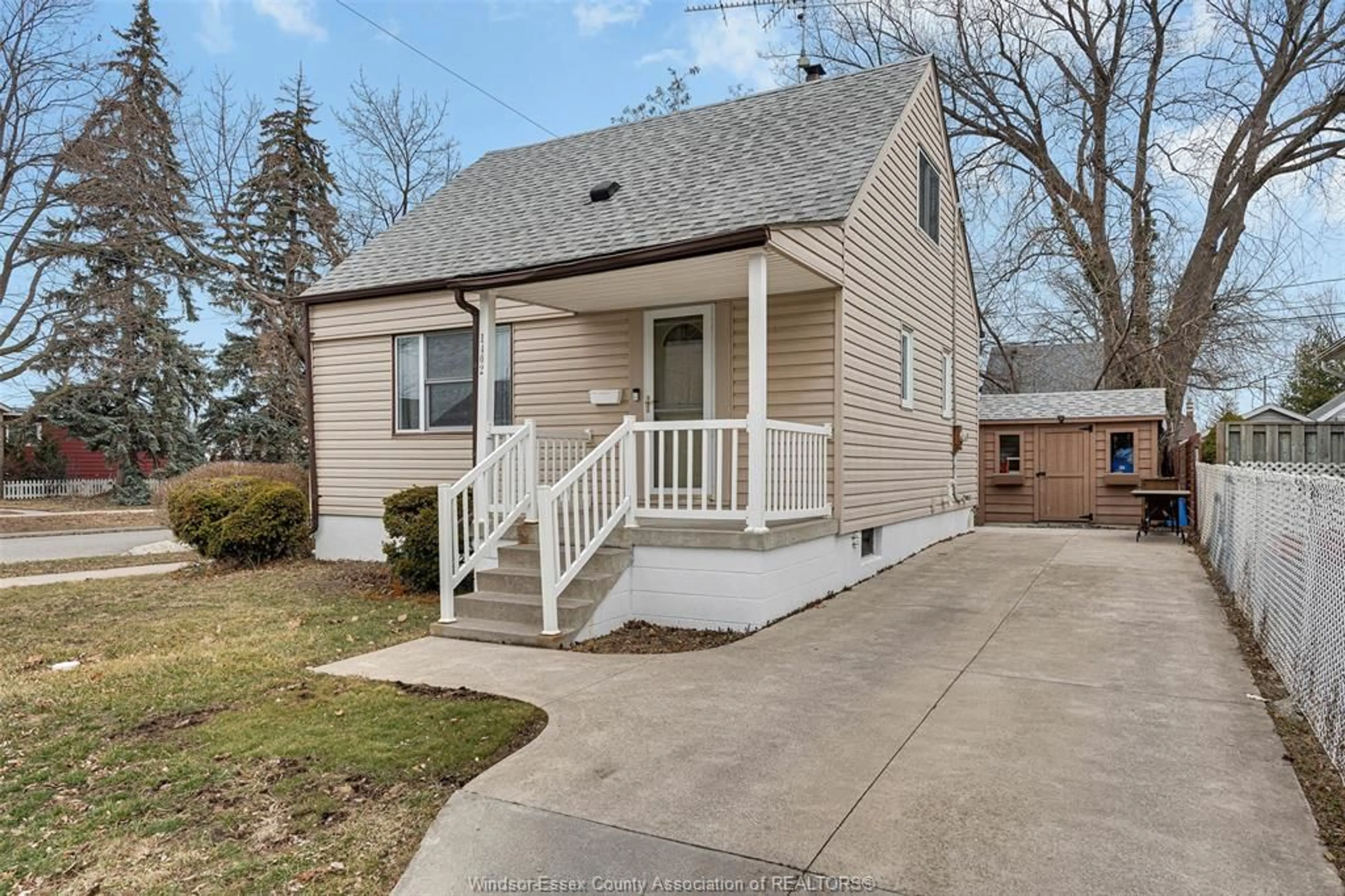 Home with vinyl exterior material, street for 1402 ARTHUR Rd, Windsor Ontario N8Y 3Y7